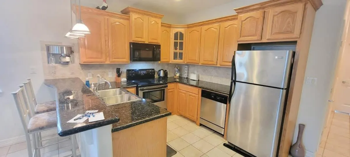 Kitchen or kitchenette in Beach & Palms condo