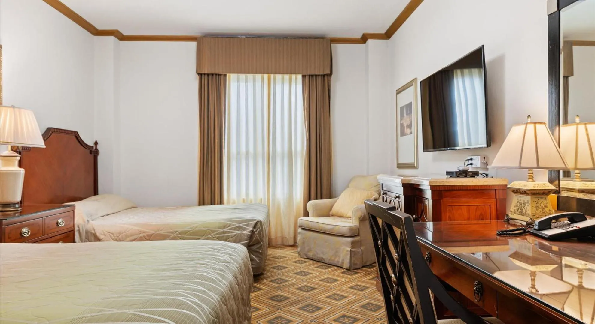 Bed in EMBASSY HOTEL