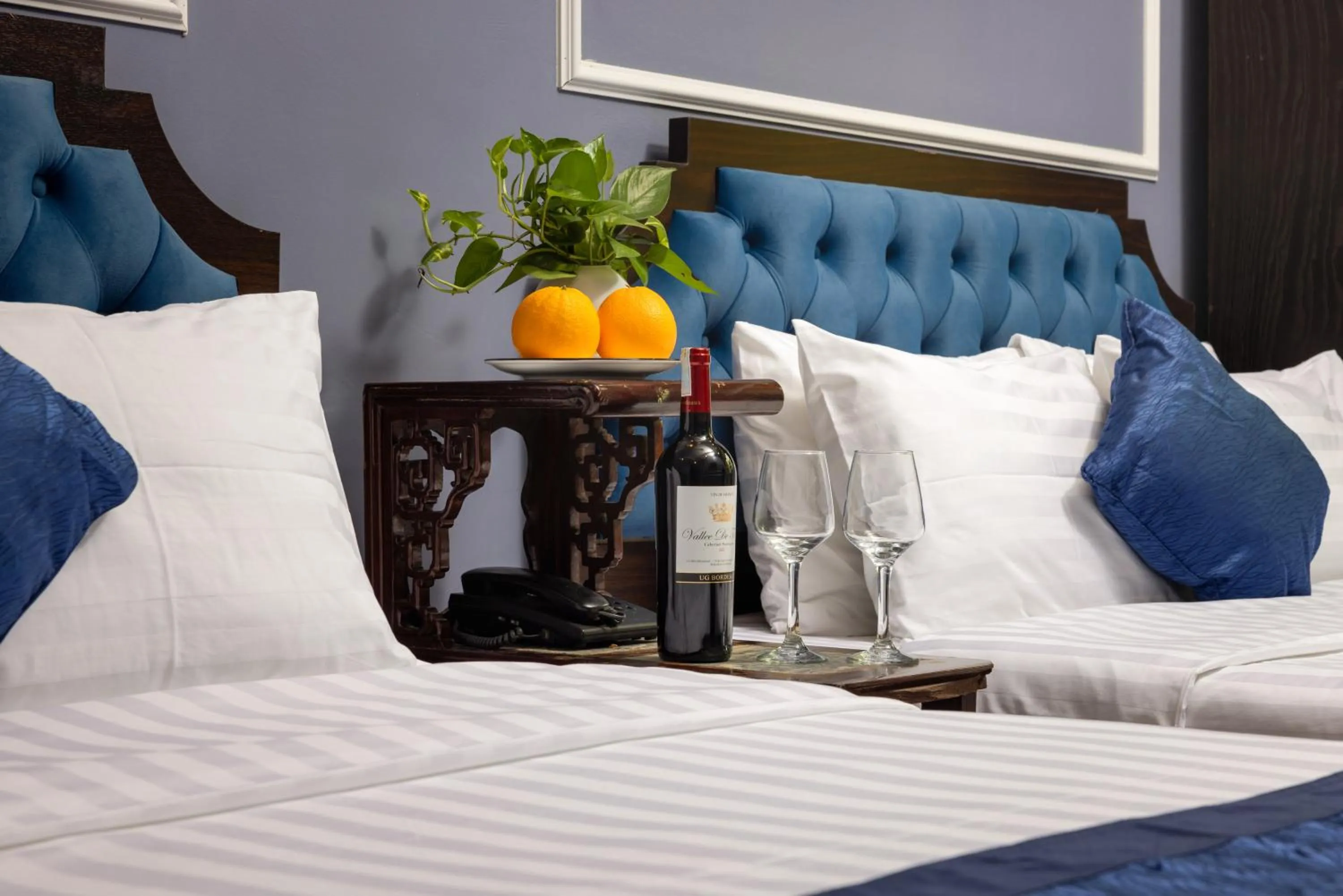 Bed in Amanda Boutique Hotel & Travel