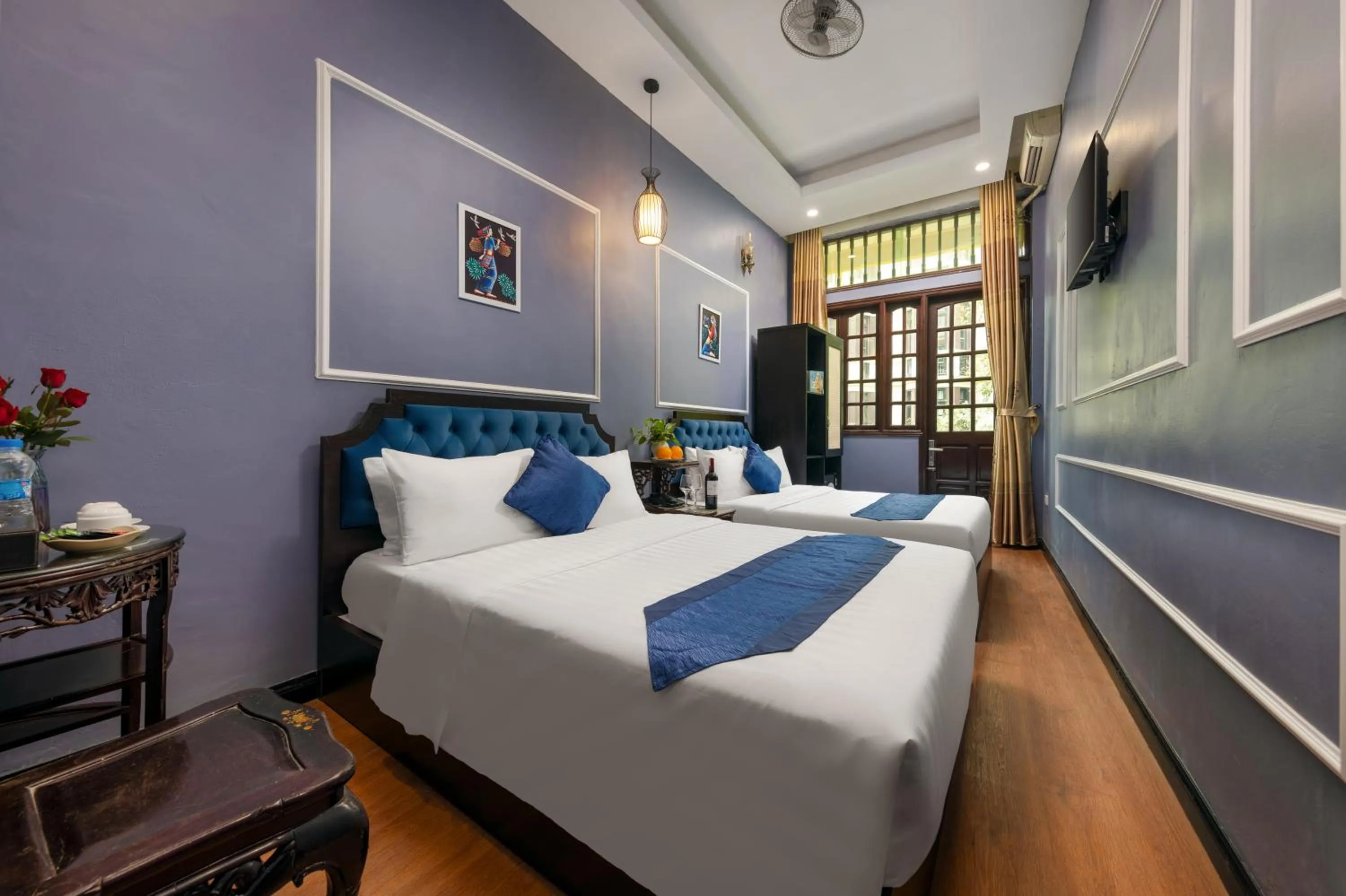 Bed in Amanda Boutique Hotel & Travel