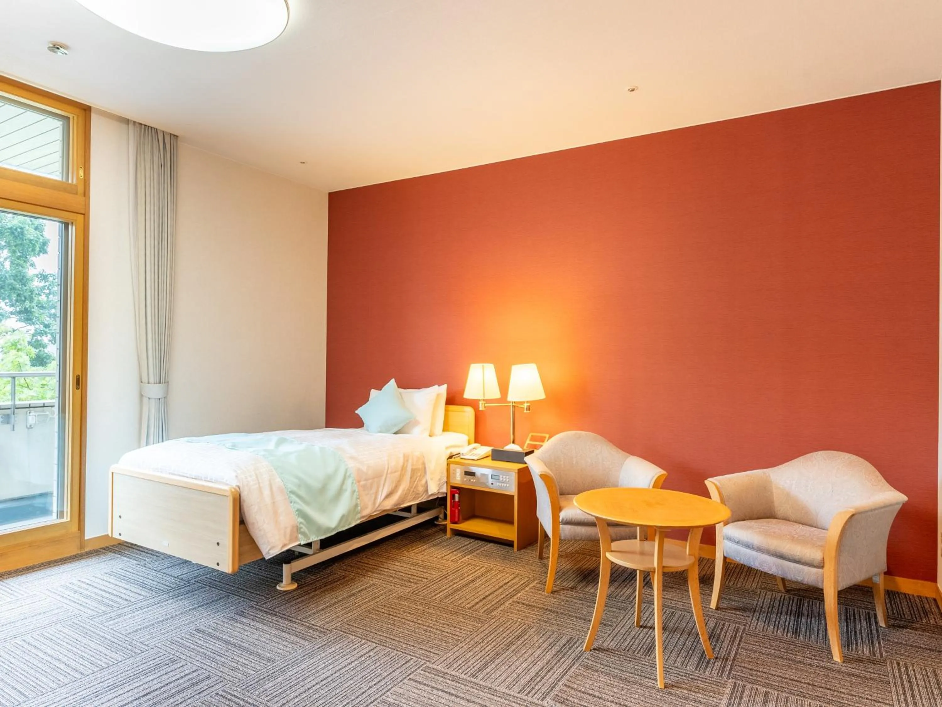 Bed in LiVEMAX Resort Upopoi Shiraoi Onsen