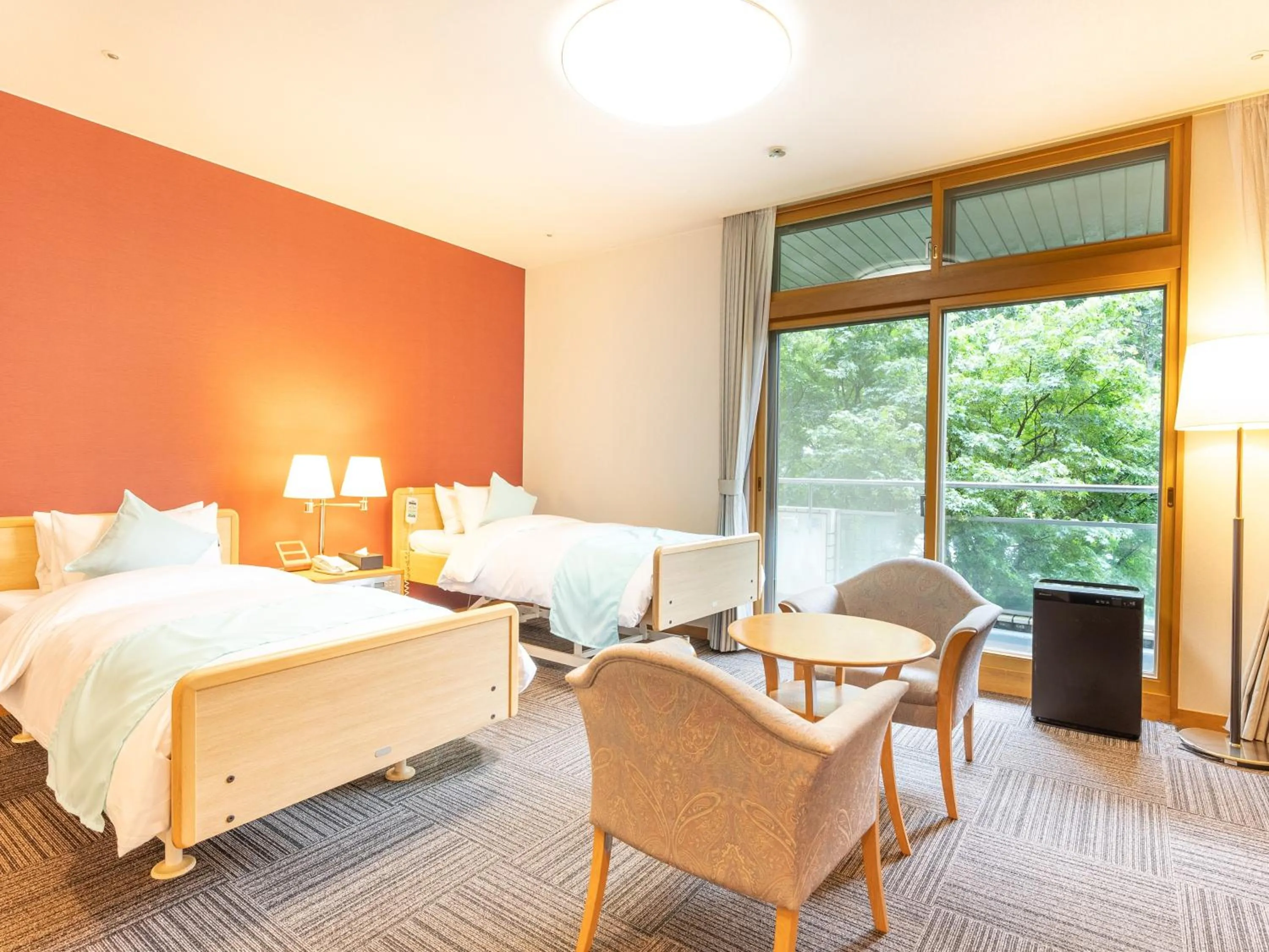 Bed in LiVEMAX Resort Upopoi Shiraoi Onsen