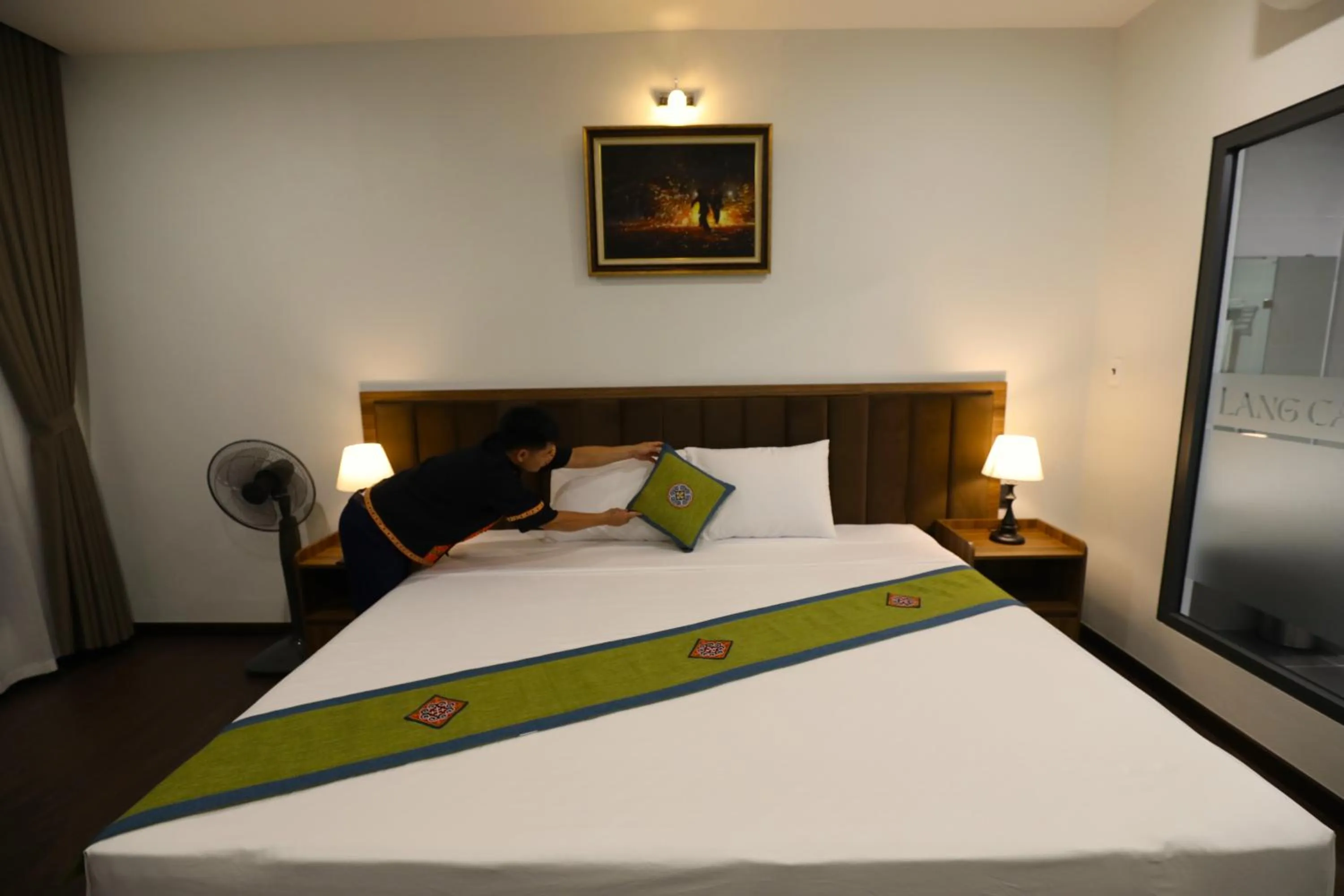 Bed in Lang Can Boutique Hotel