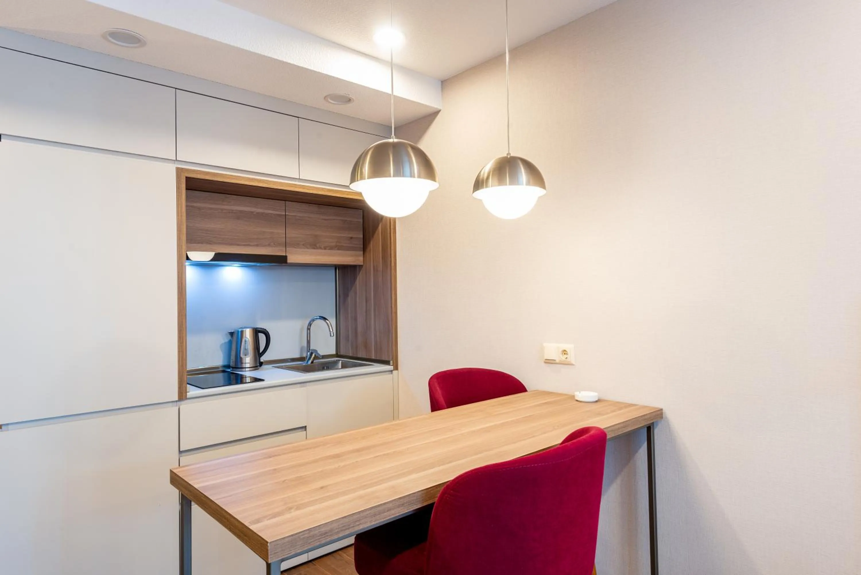 Kitchen or kitchenette in Sunshine Residence & Hotel