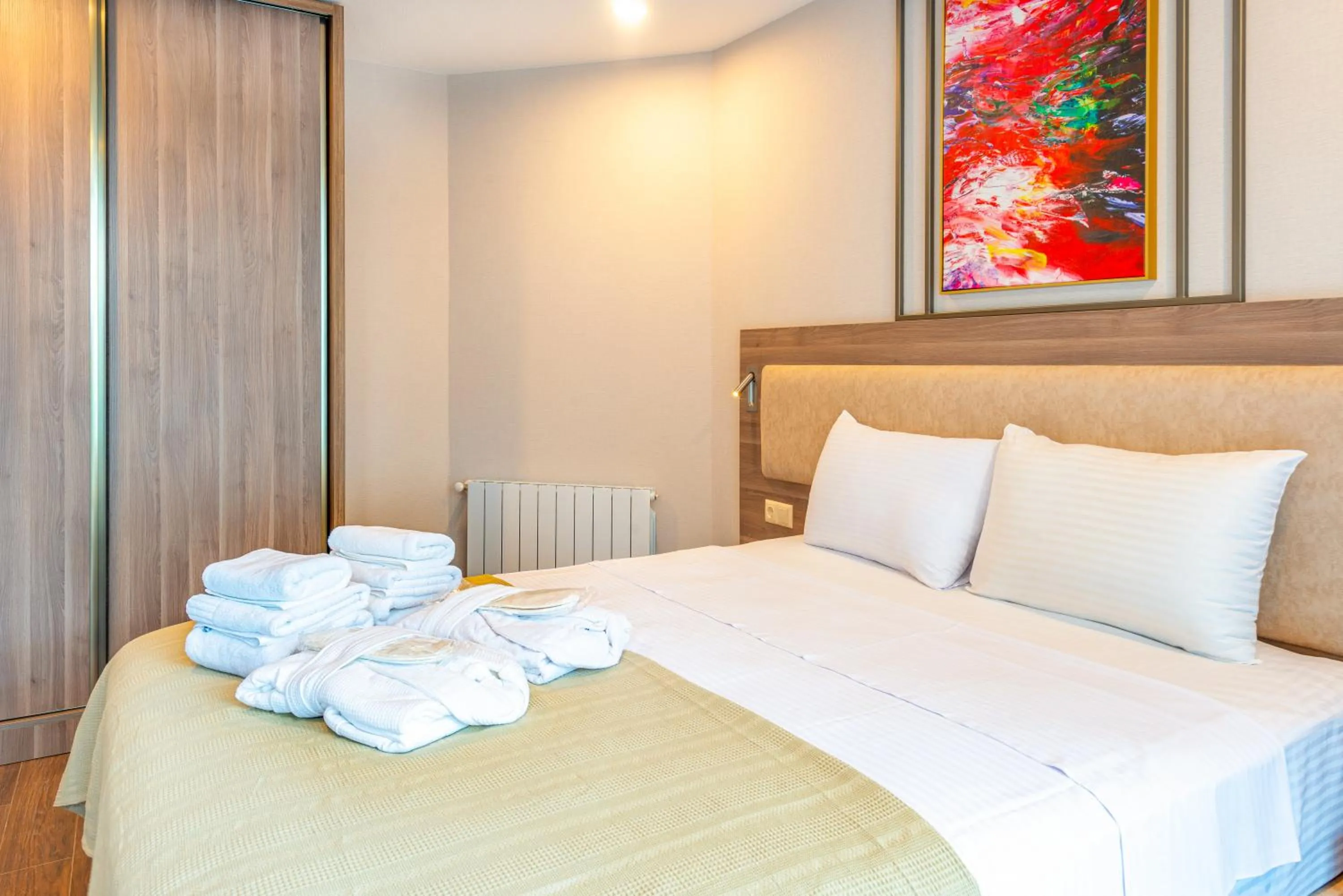 Bed in Sunshine Residence & Hotel