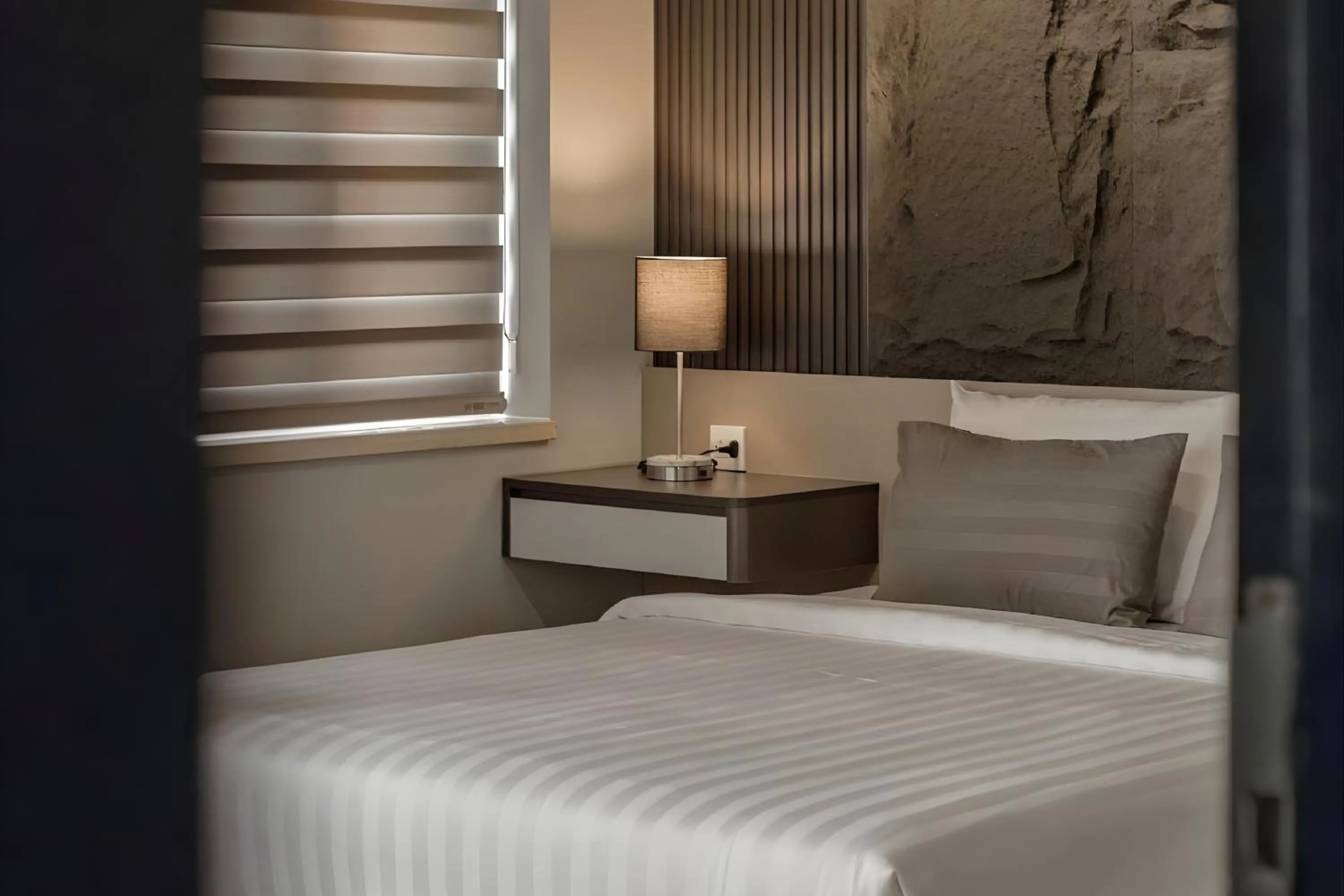 Bed in Simmi Signature Hotel & Apartment