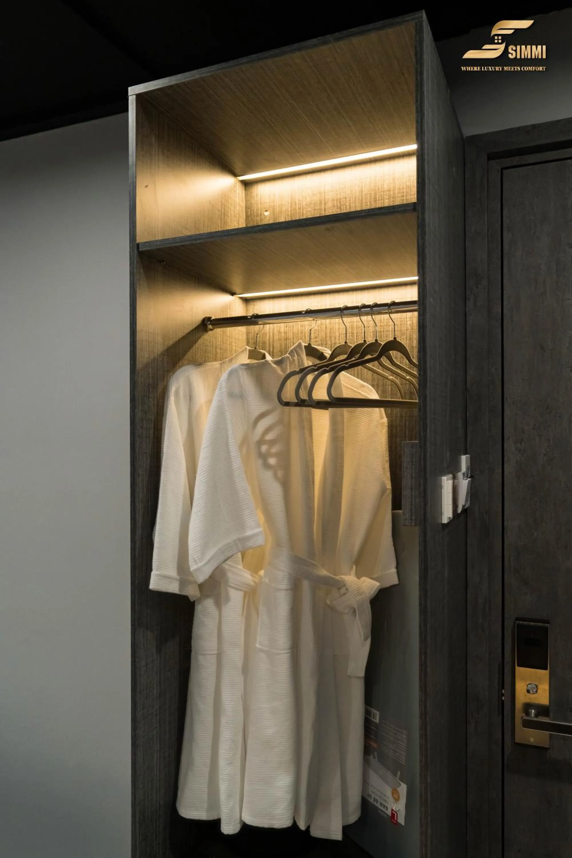 wardrobe in Simmi Signature Hotel & Apartment