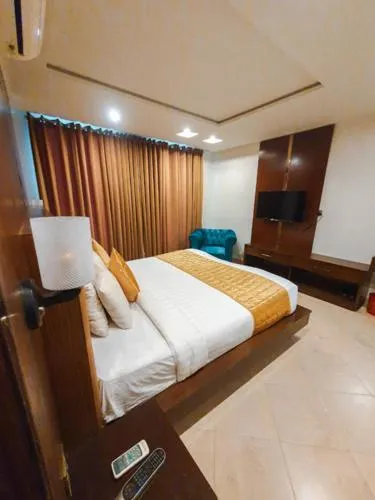 Bed in Bling International Hotel Multan