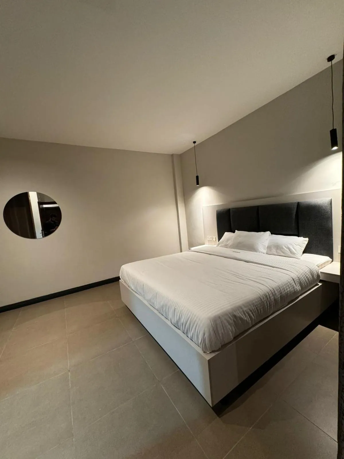 Bed in The Ivory Hotel