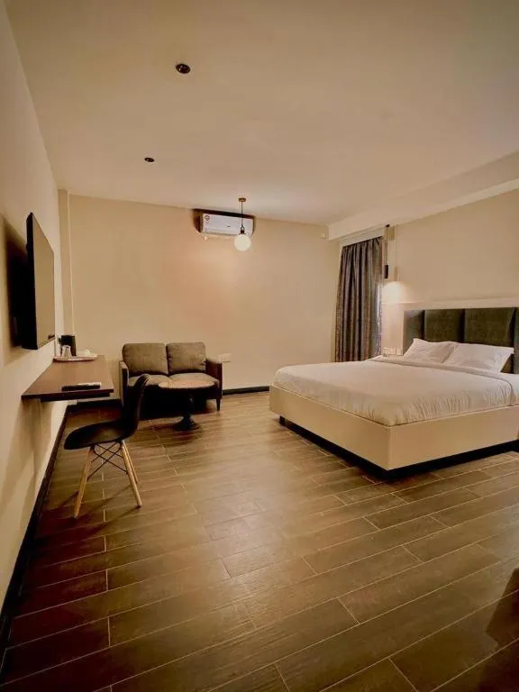 Bed in The Ivory Hotel