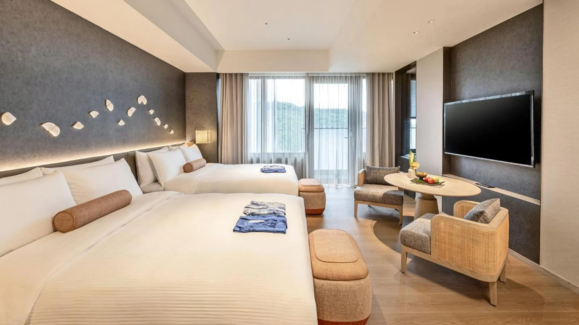 Photo of the whole room, Bed in 北投晶泉丰旅 Wellspring by Silks Beitou