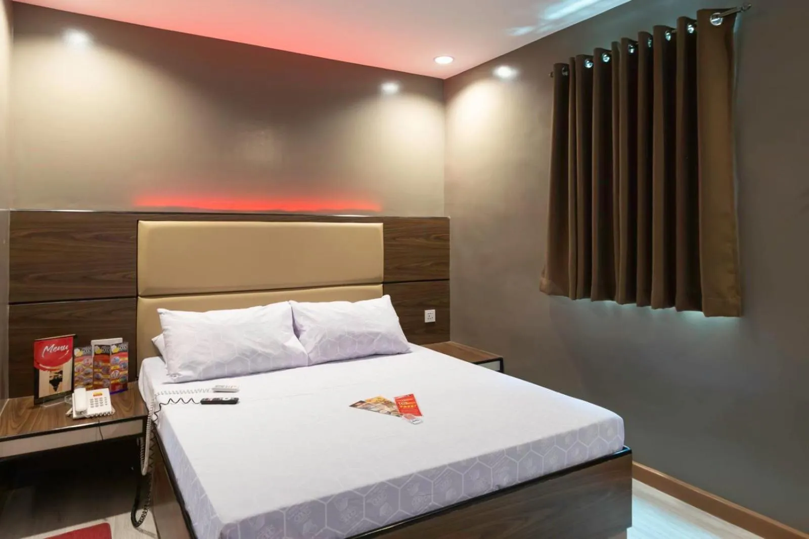 Photo of the whole room, Bed in Hotel Sogo Cagayan De Oro