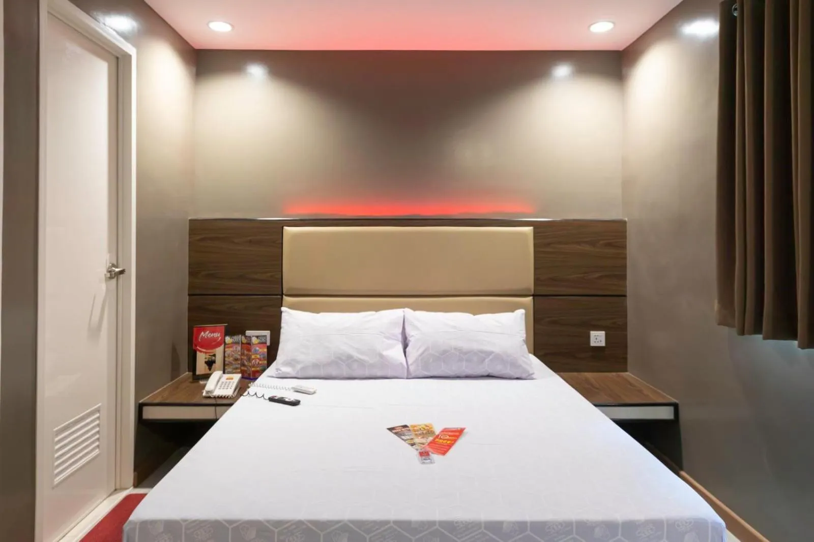 Photo of the whole room, Bed in Hotel Sogo Cagayan De Oro