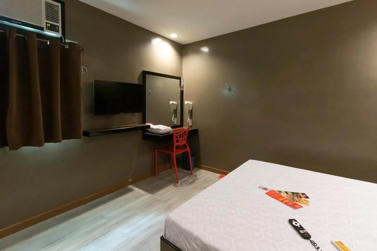 Photo of the whole room, Bed in Hotel Sogo Cagayan De Oro