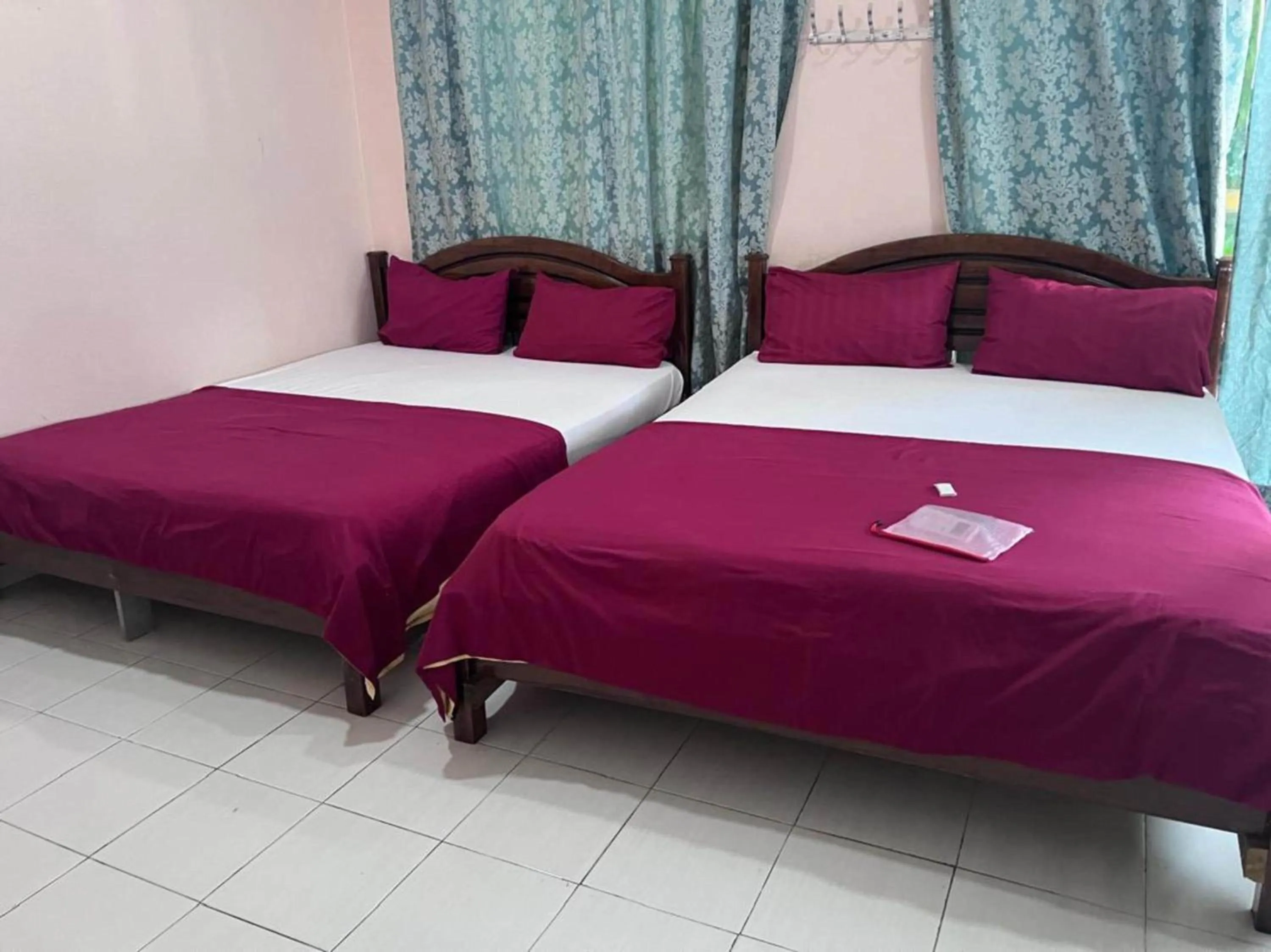 Bedroom in OYO 90981 Chenang Rest House 1