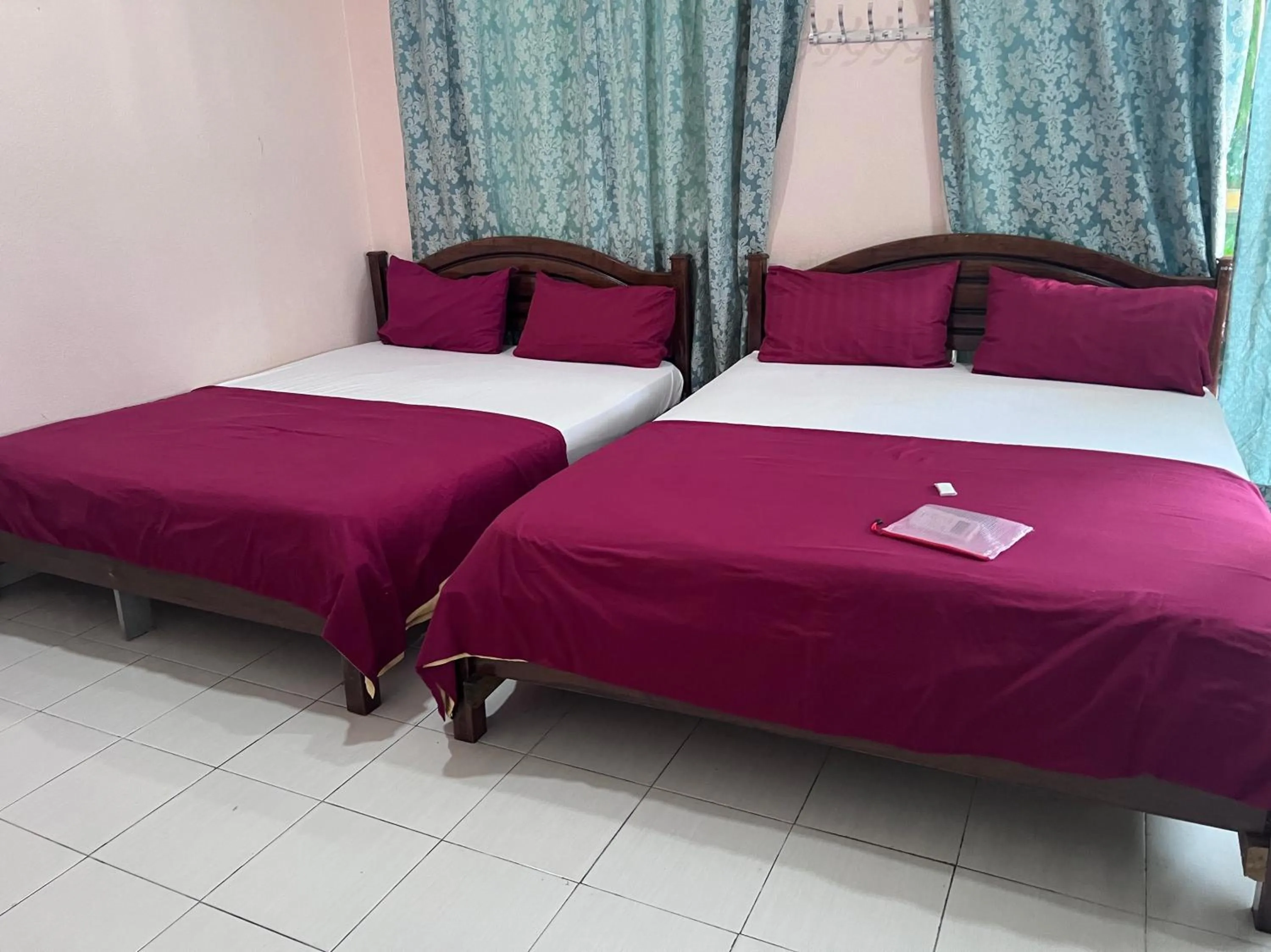 Bedroom in OYO 90981 Chenang Rest House 1