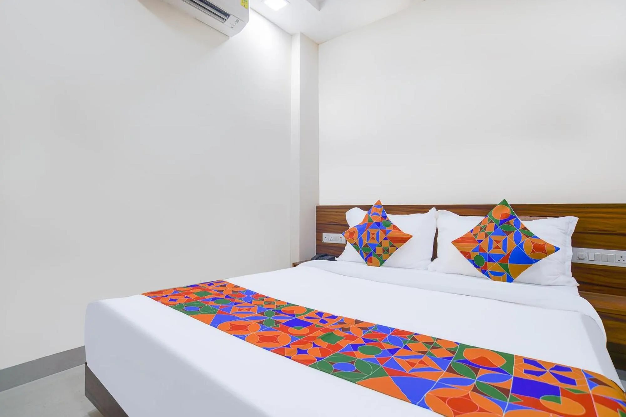 Bed in FabHotel J Palace