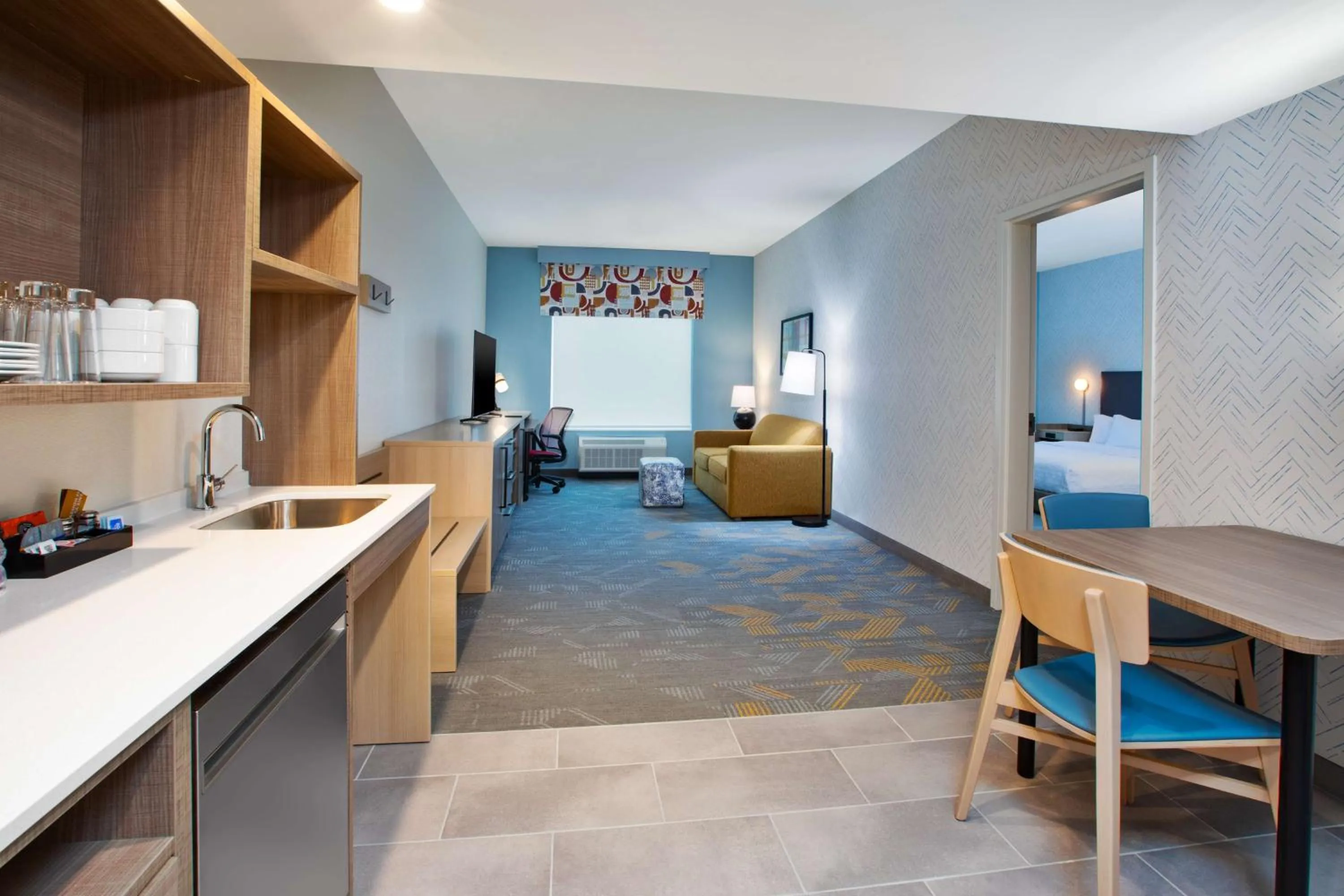 Living room in Home2 Suites By Hilton Grand Rapids Northeast