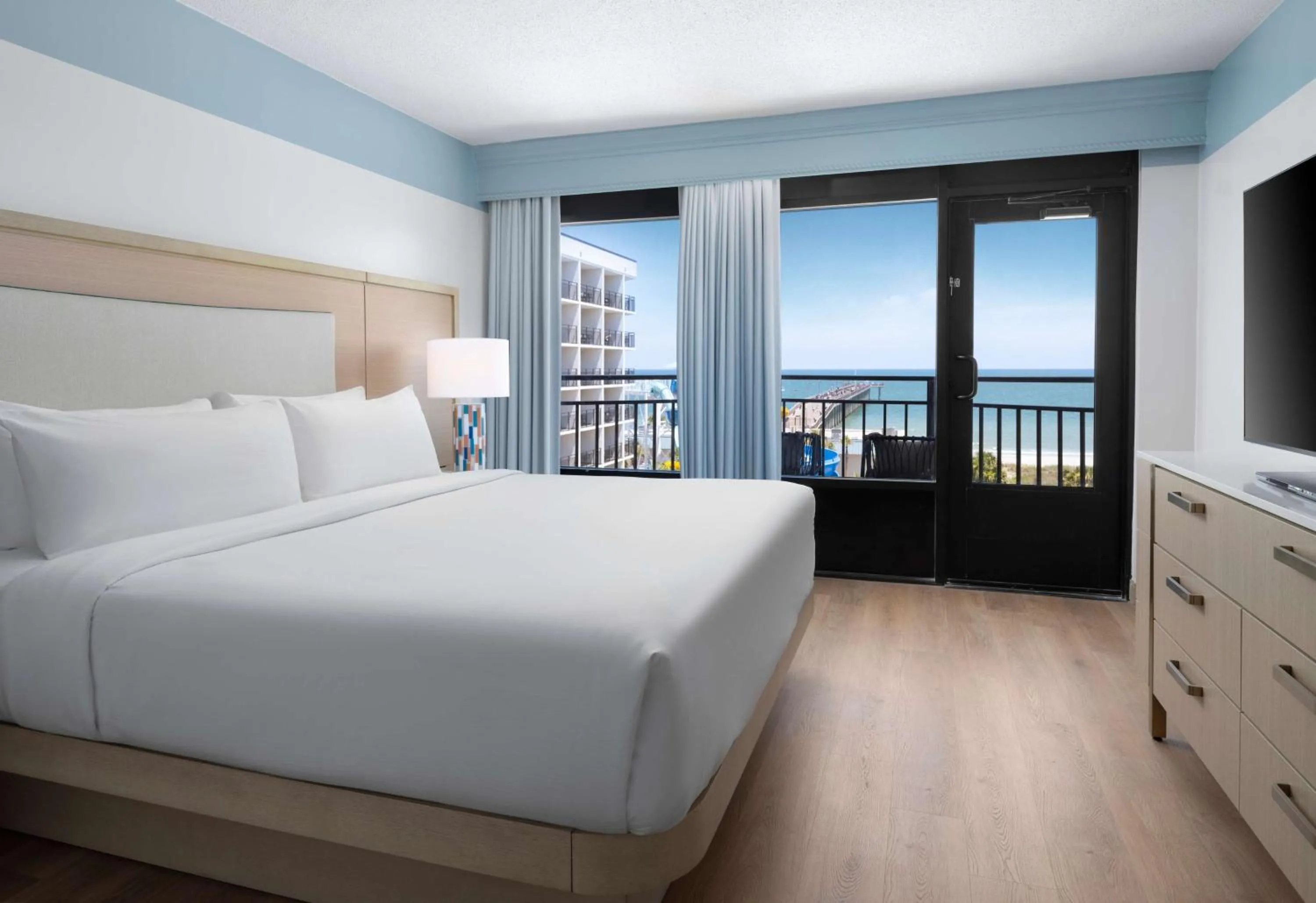 Bed in The Ellie Beach Resort Myrtle Beach, Tapestry By Hilton