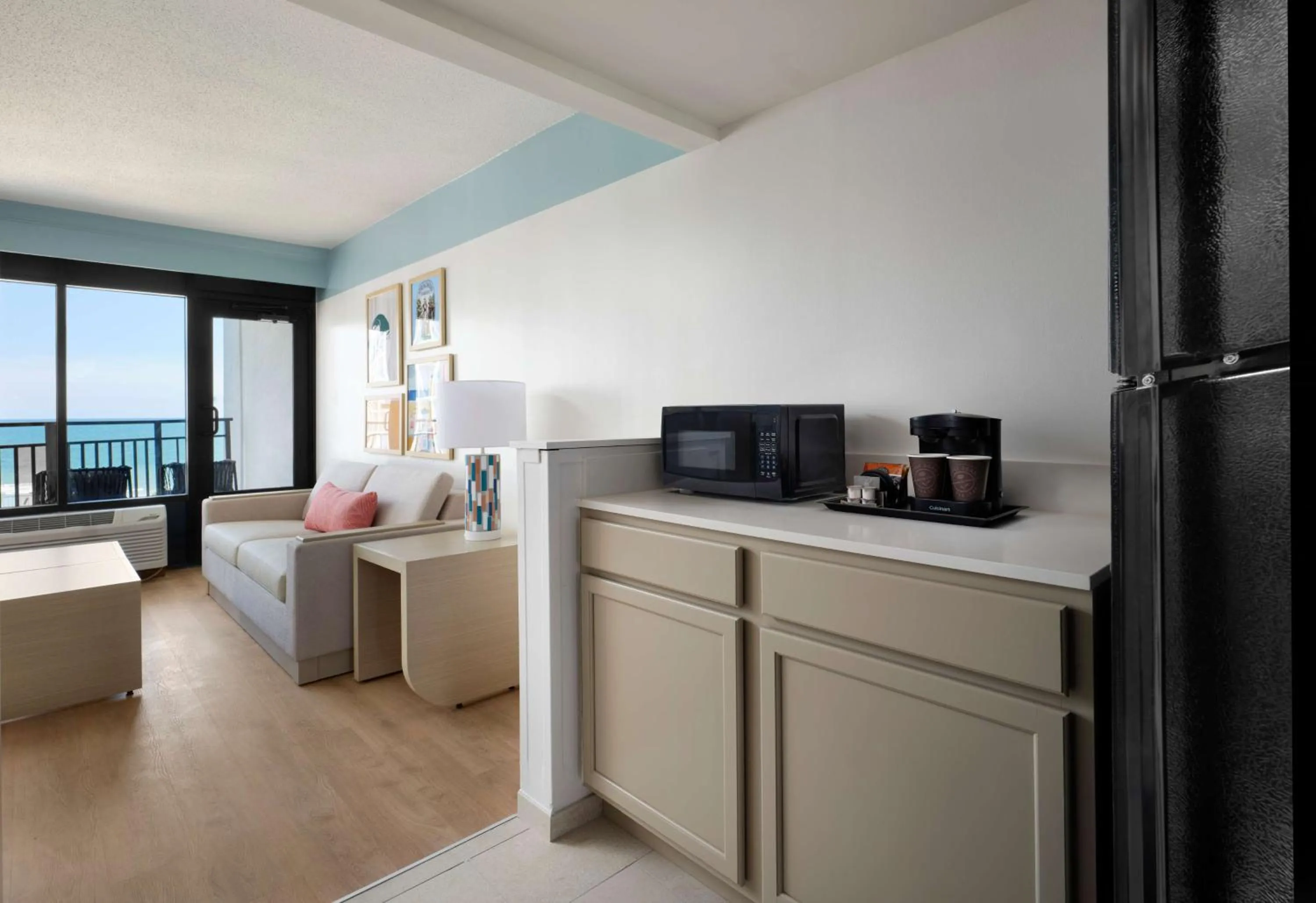 Toilet, Bed in The Ellie Beach Resort Myrtle Beach, Tapestry By Hilton