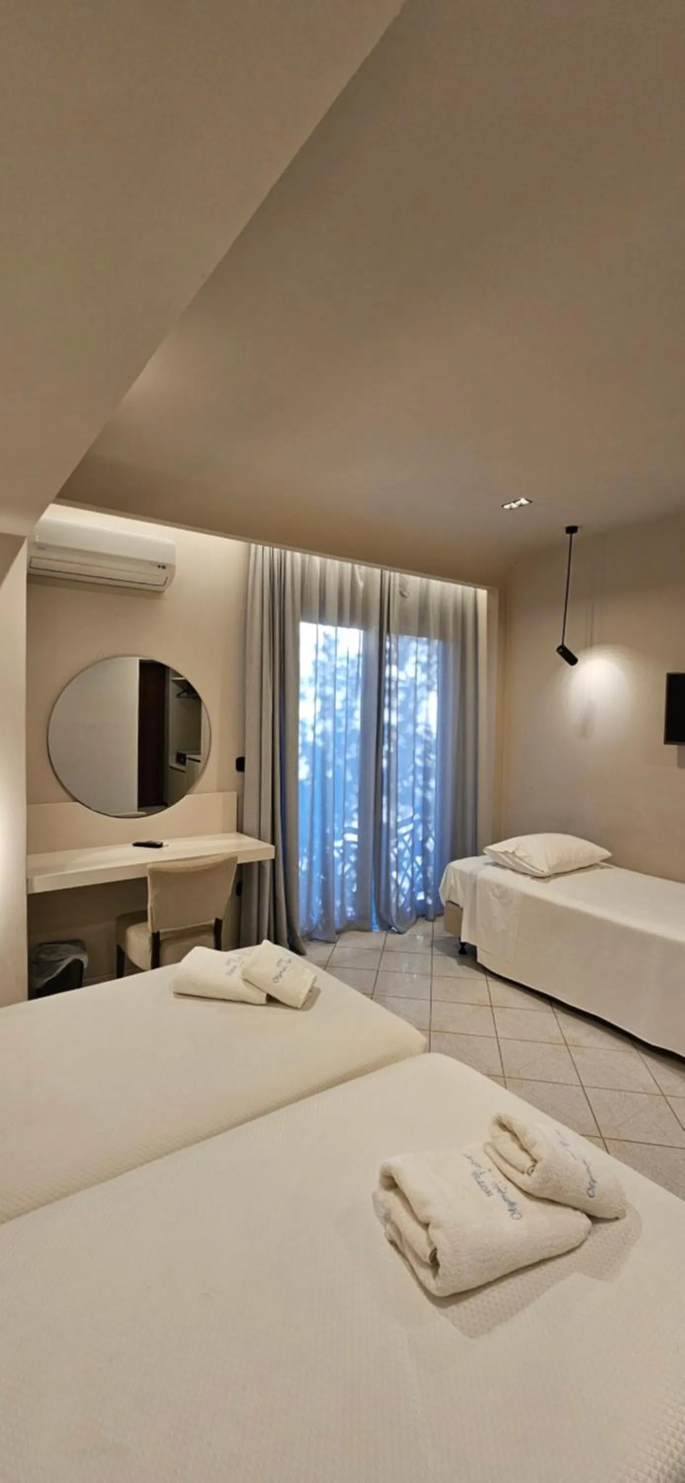 Bed in Olympic Village Hotel & SPA