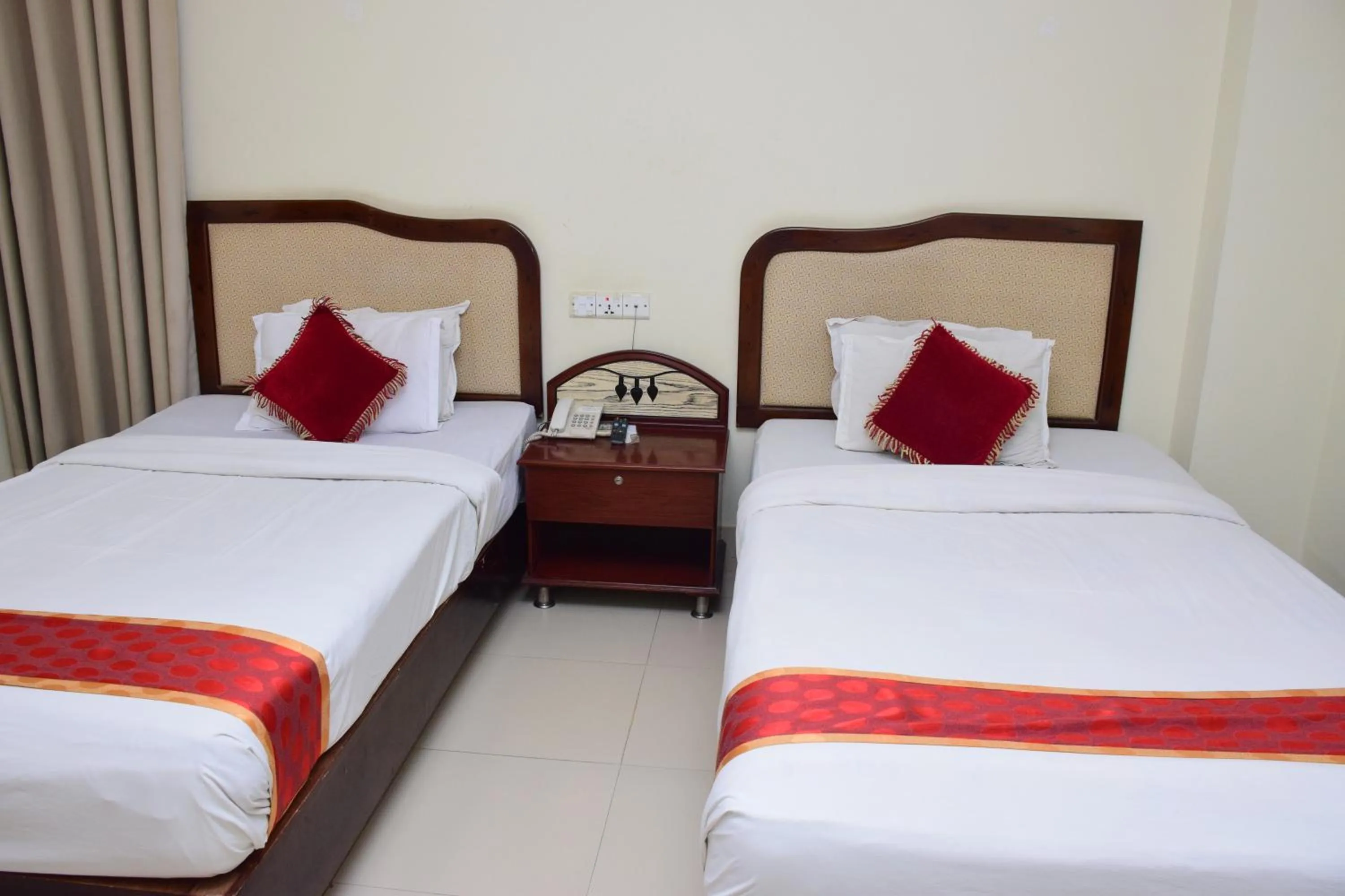 Bed in Panshi Inn Sylhet