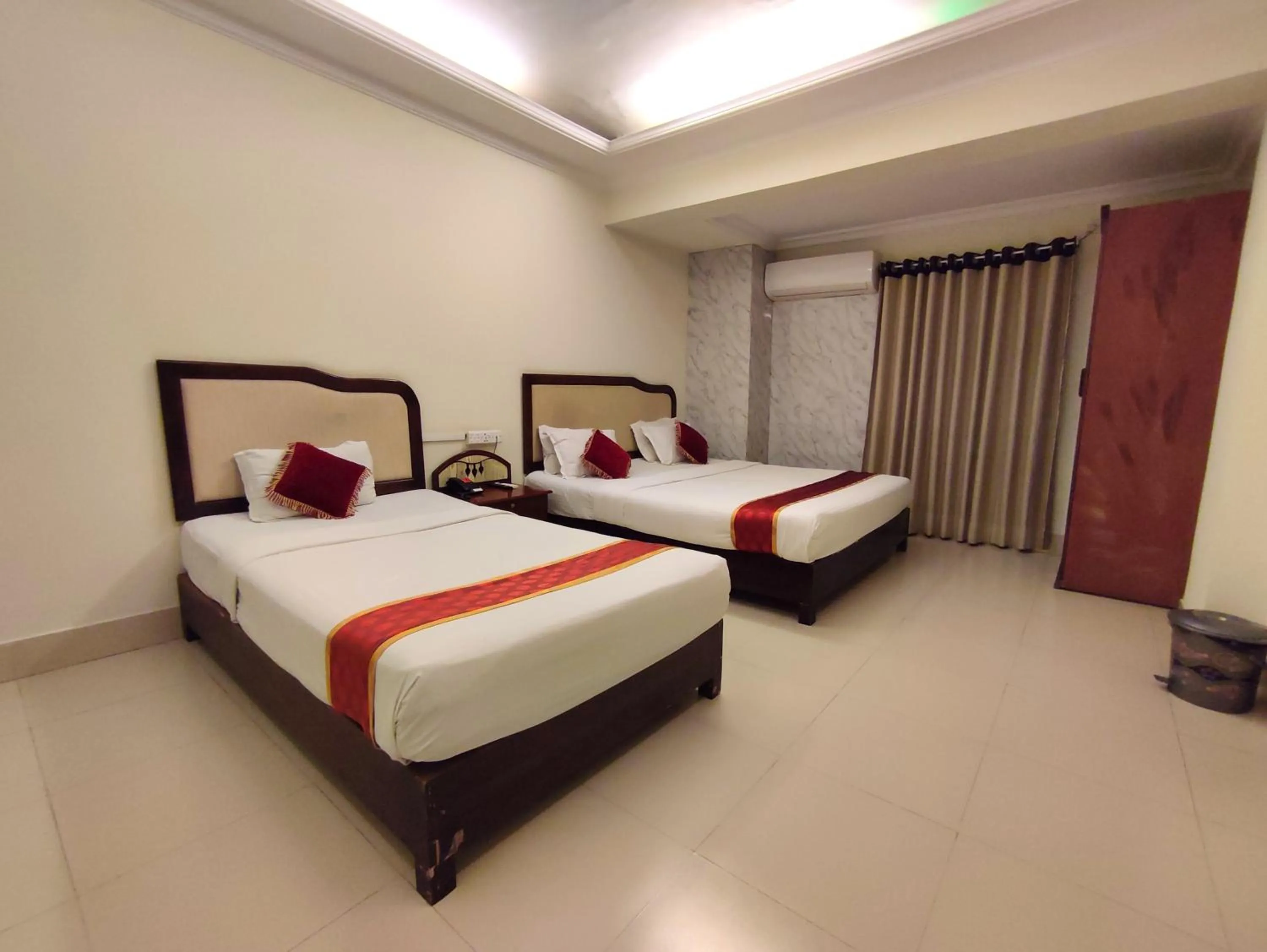 Bed in Panshi Inn Sylhet