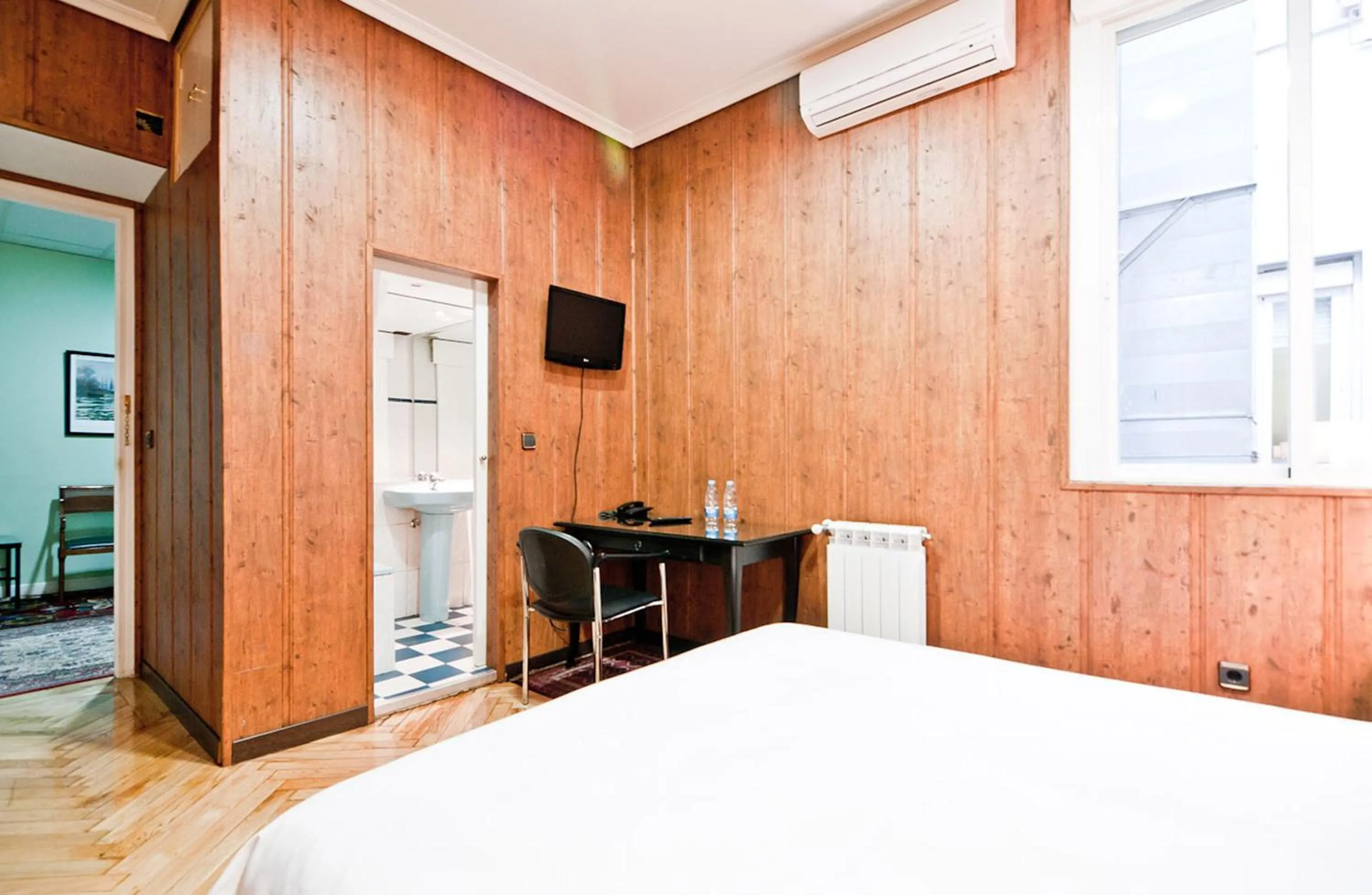 Bed in Hostal Asunción