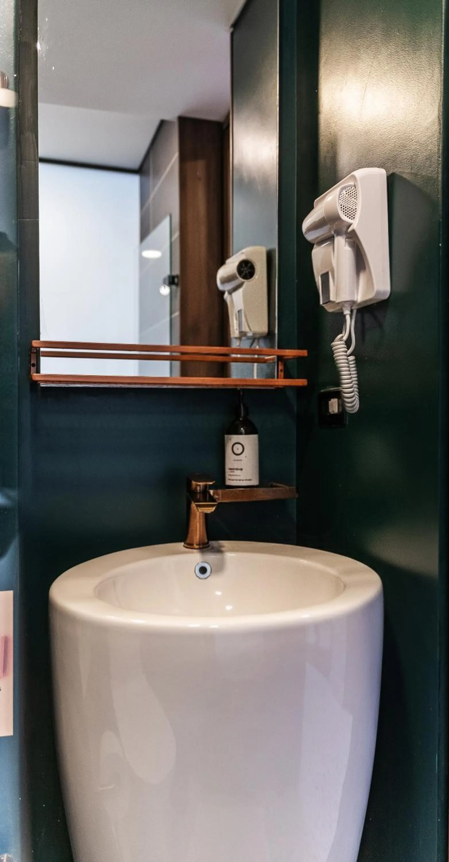 Bathroom in The O by Seekers Medellín