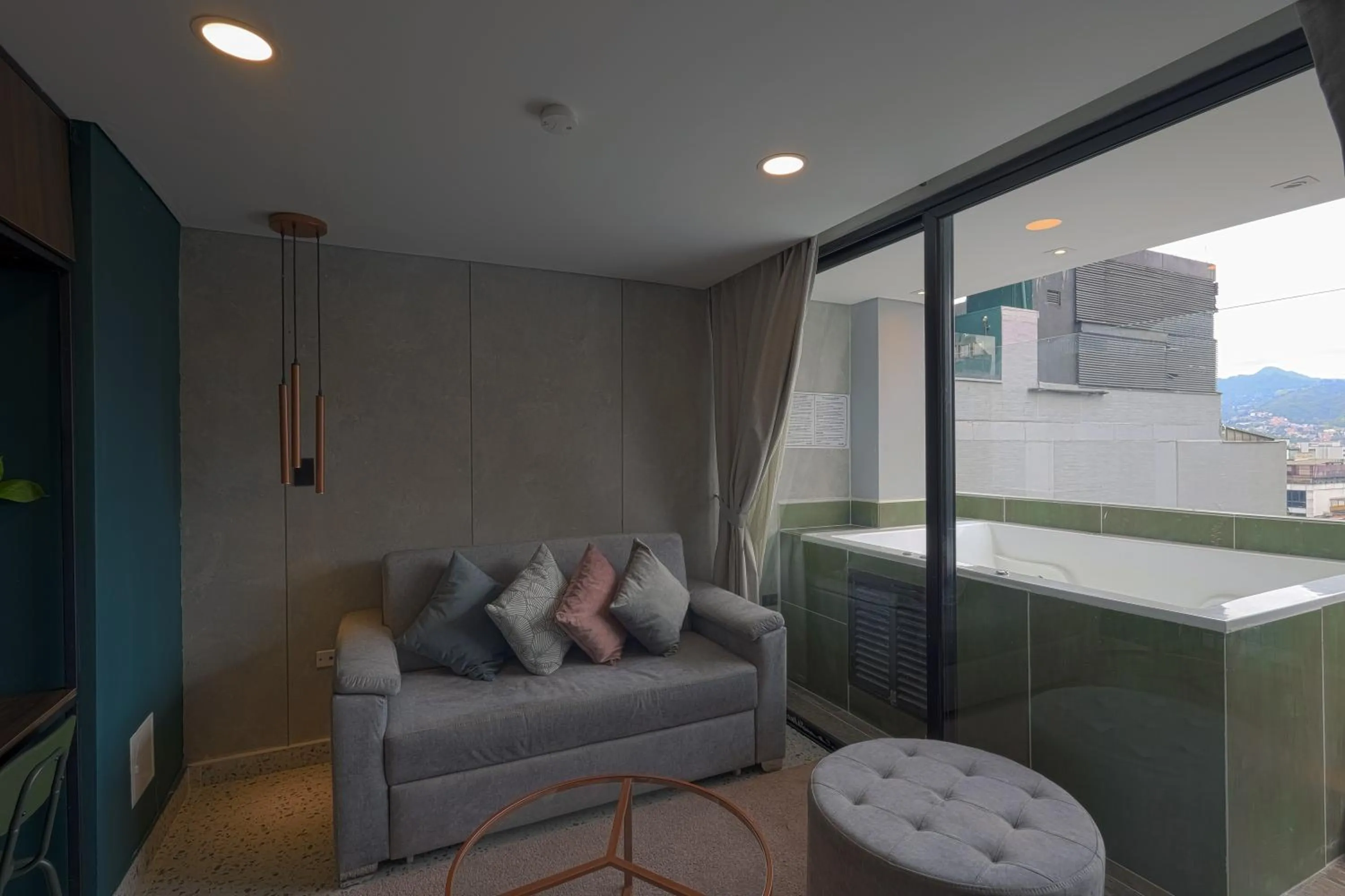 Living room in The O by Seekers Medellín