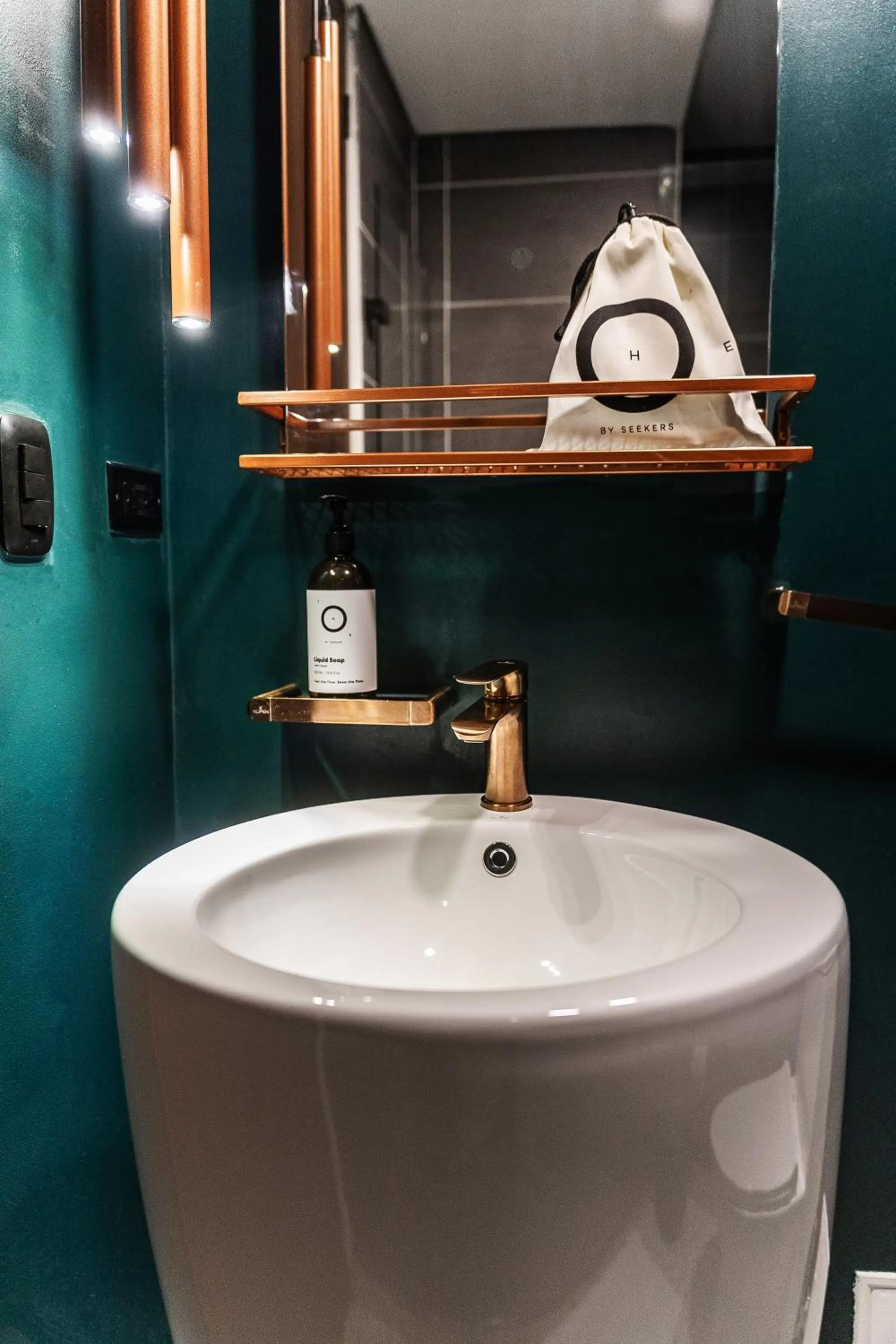 Bathroom in The O by Seekers Medellín