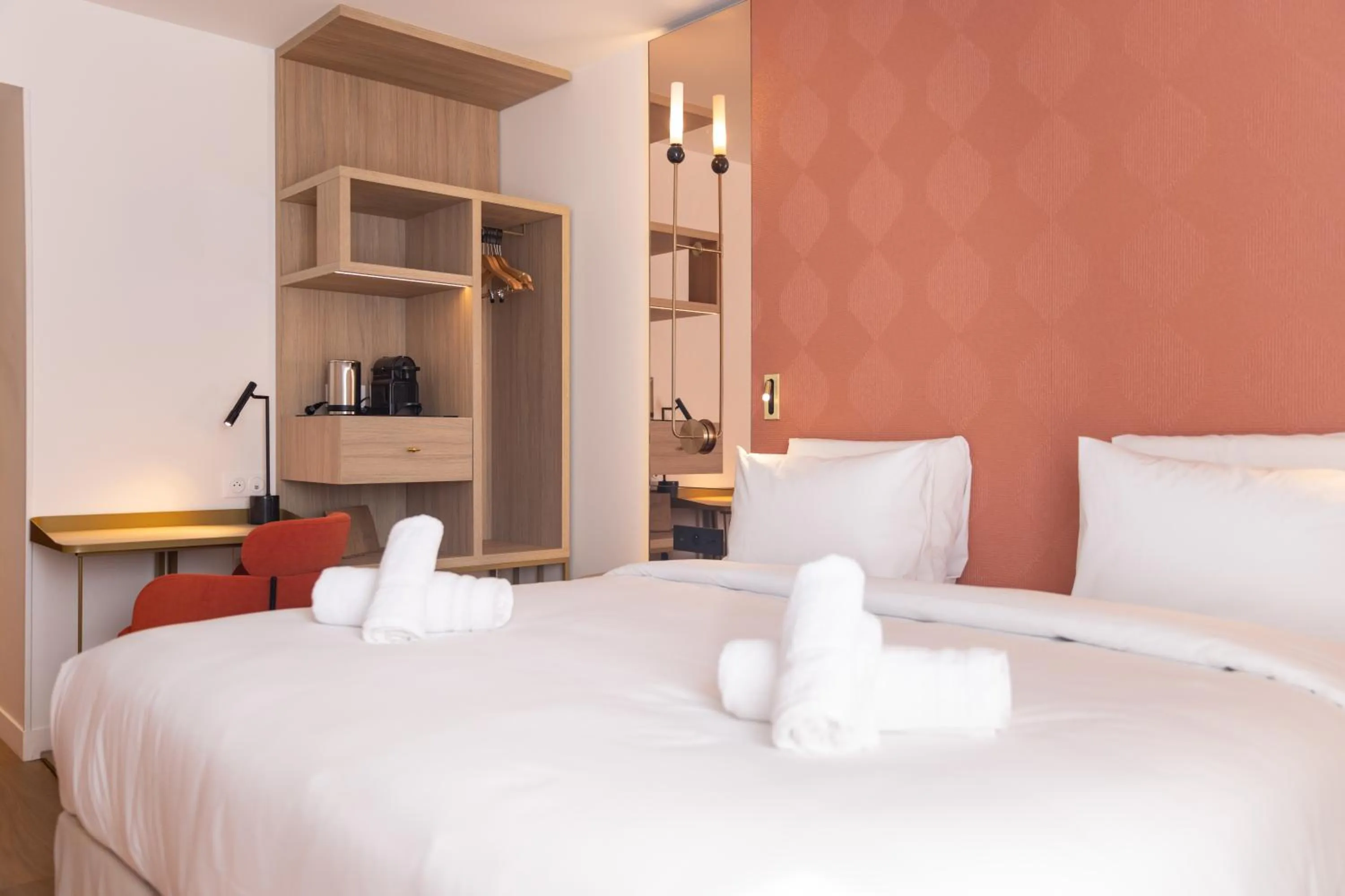 Bed in Hôtel Kyriad Prestige Paris Asnieres