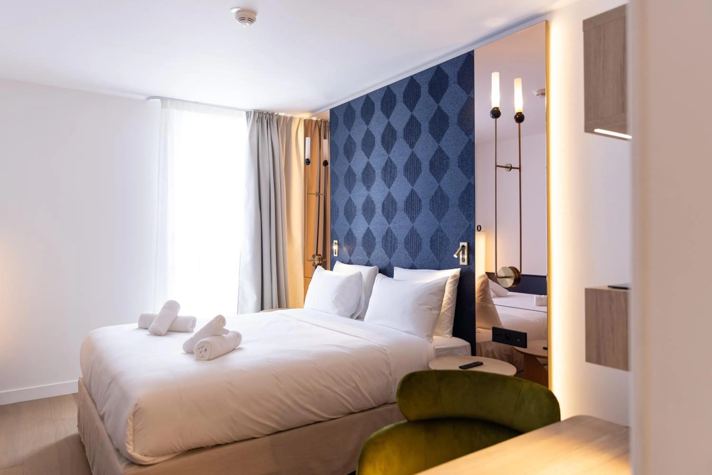 Bed in Hôtel Kyriad Prestige Paris Asnieres