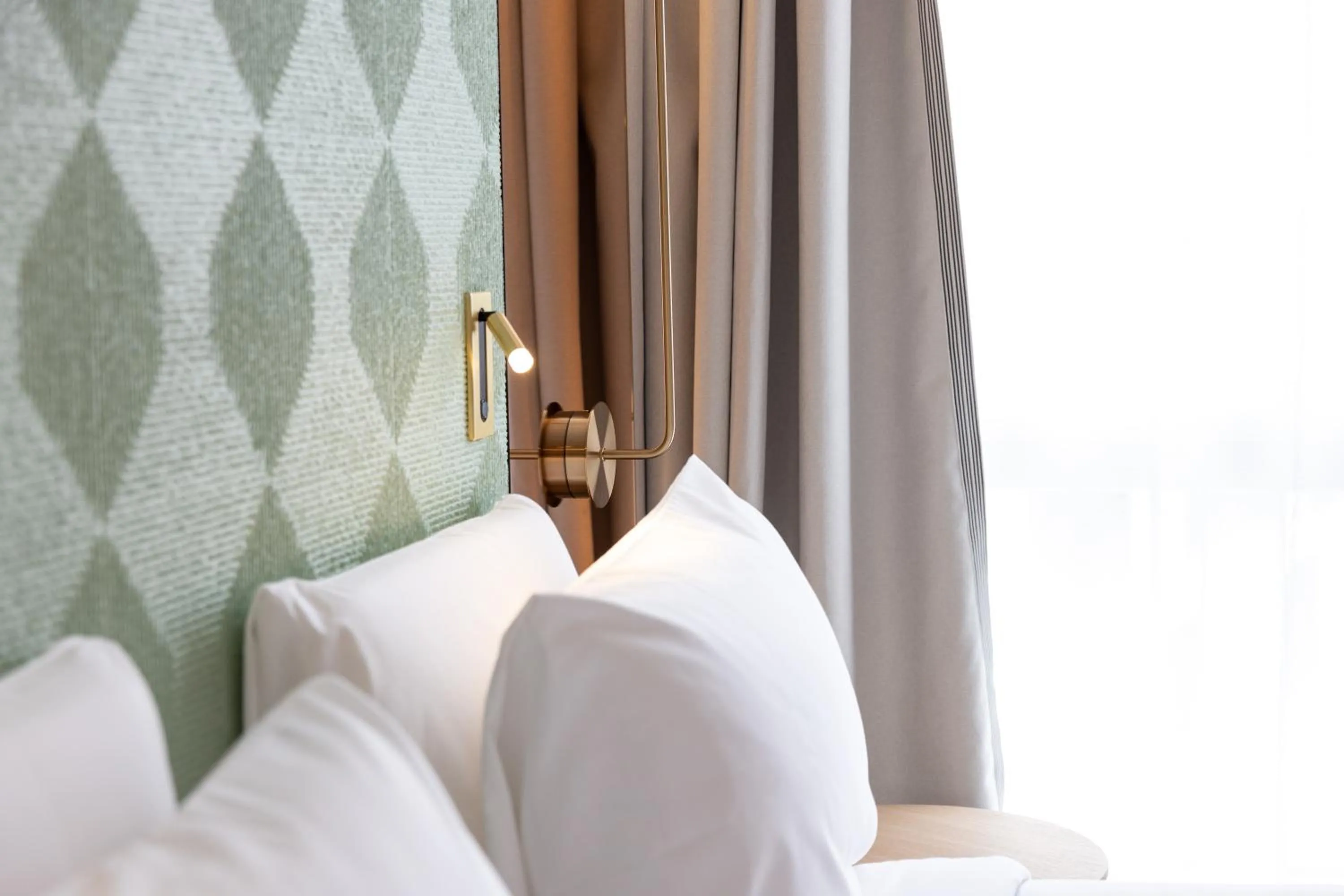 Bed in Hôtel Kyriad Prestige Paris Asnieres