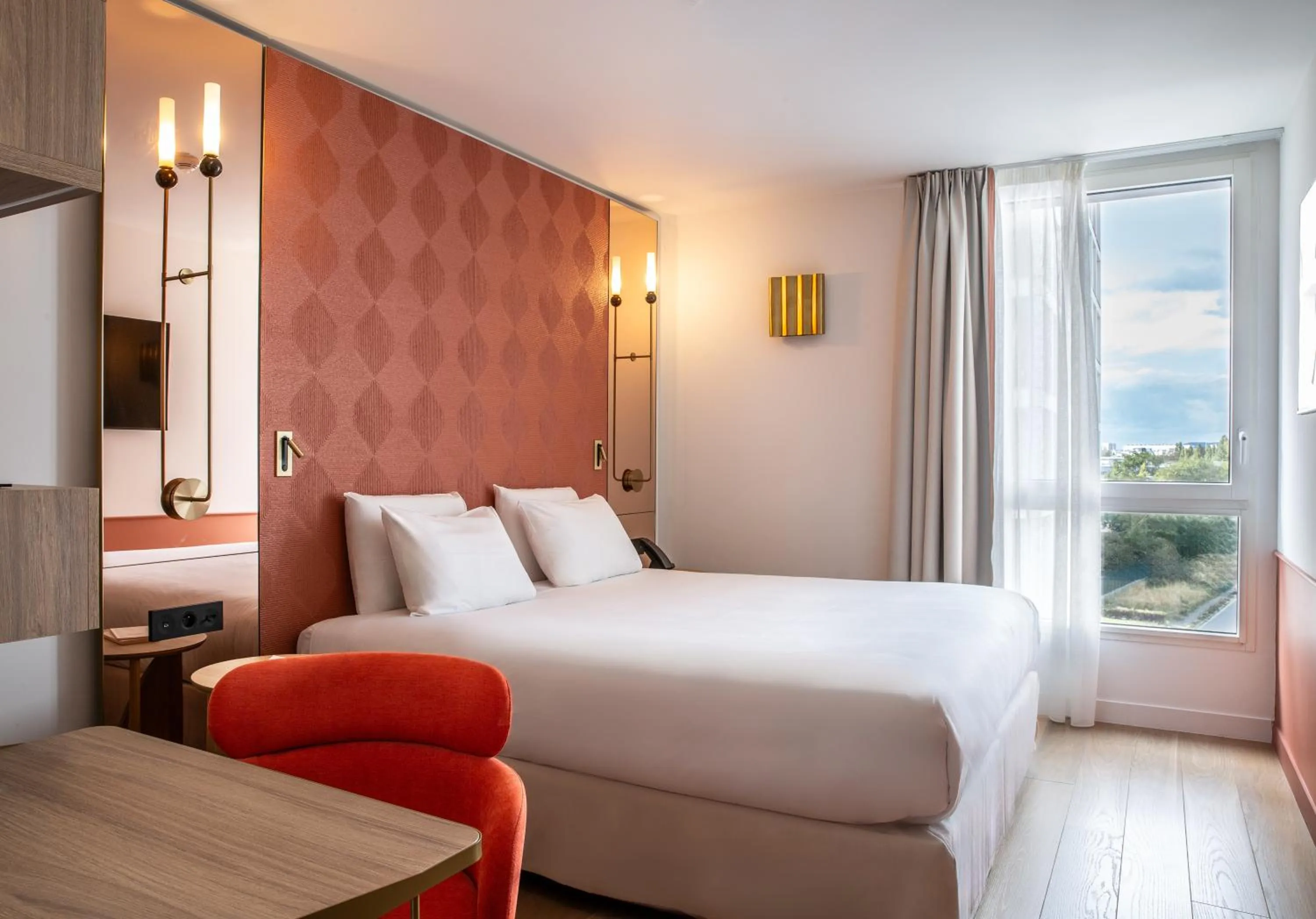 Bed in Hôtel Kyriad Prestige Paris Asnieres