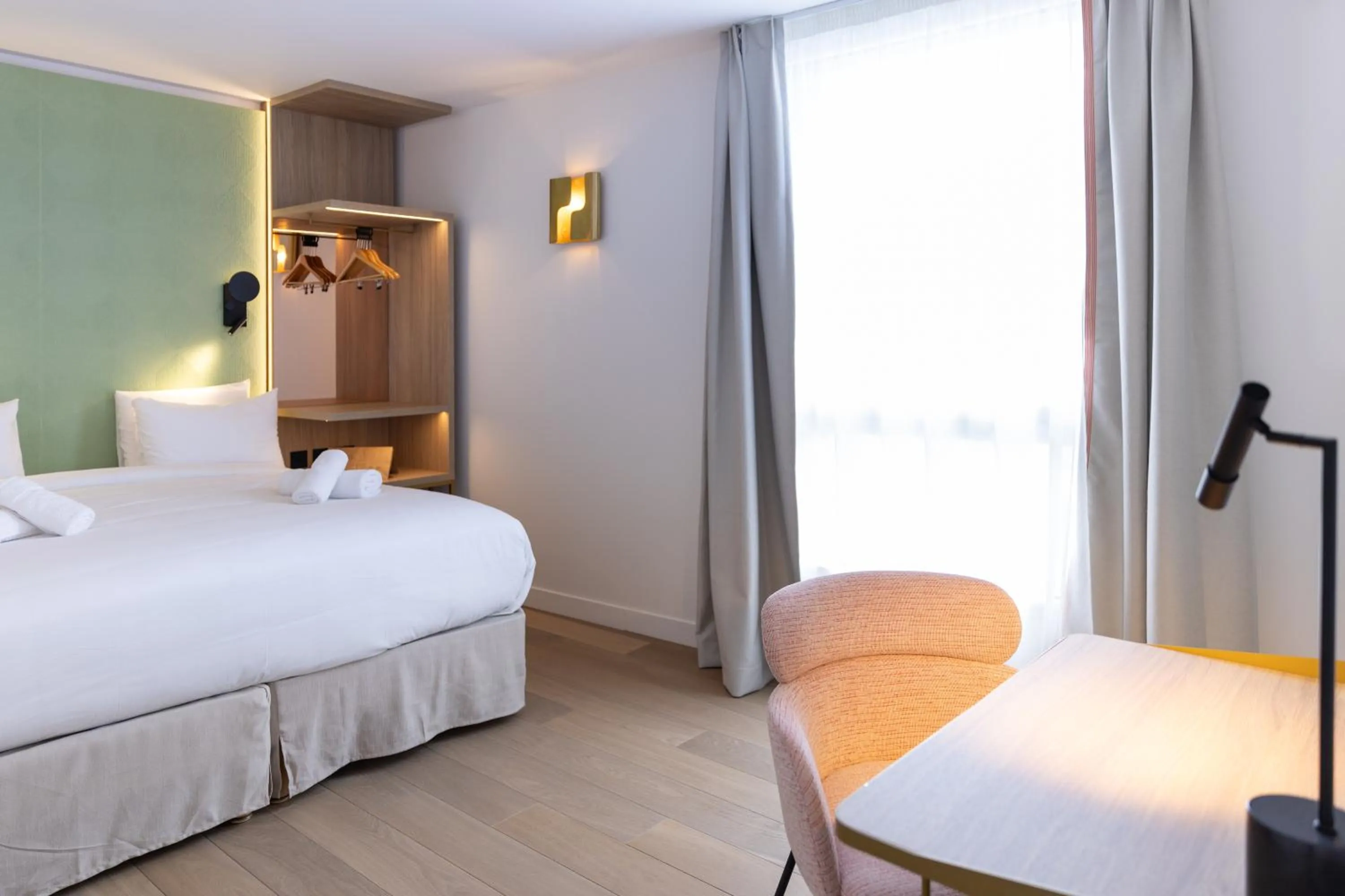 Bed in Hôtel Kyriad Prestige Paris Asnieres