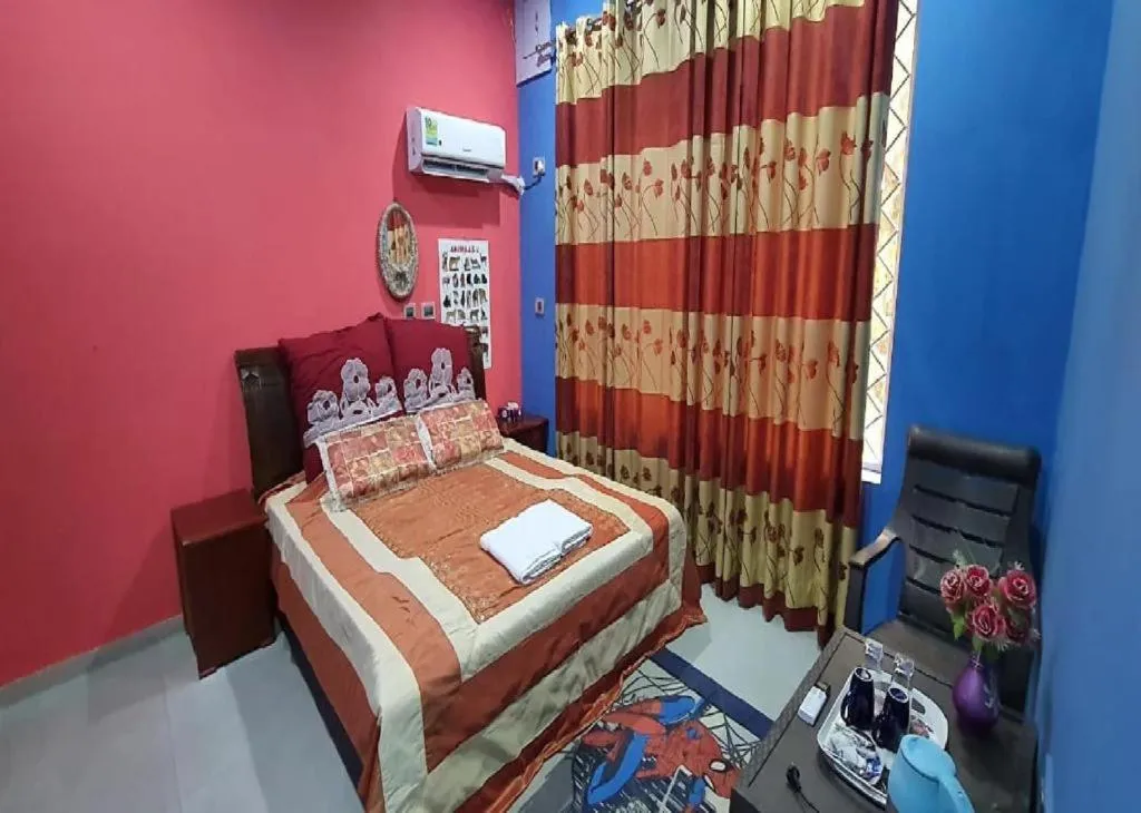 Bed in PRITHVI FARM COTTAGE AND VILLA