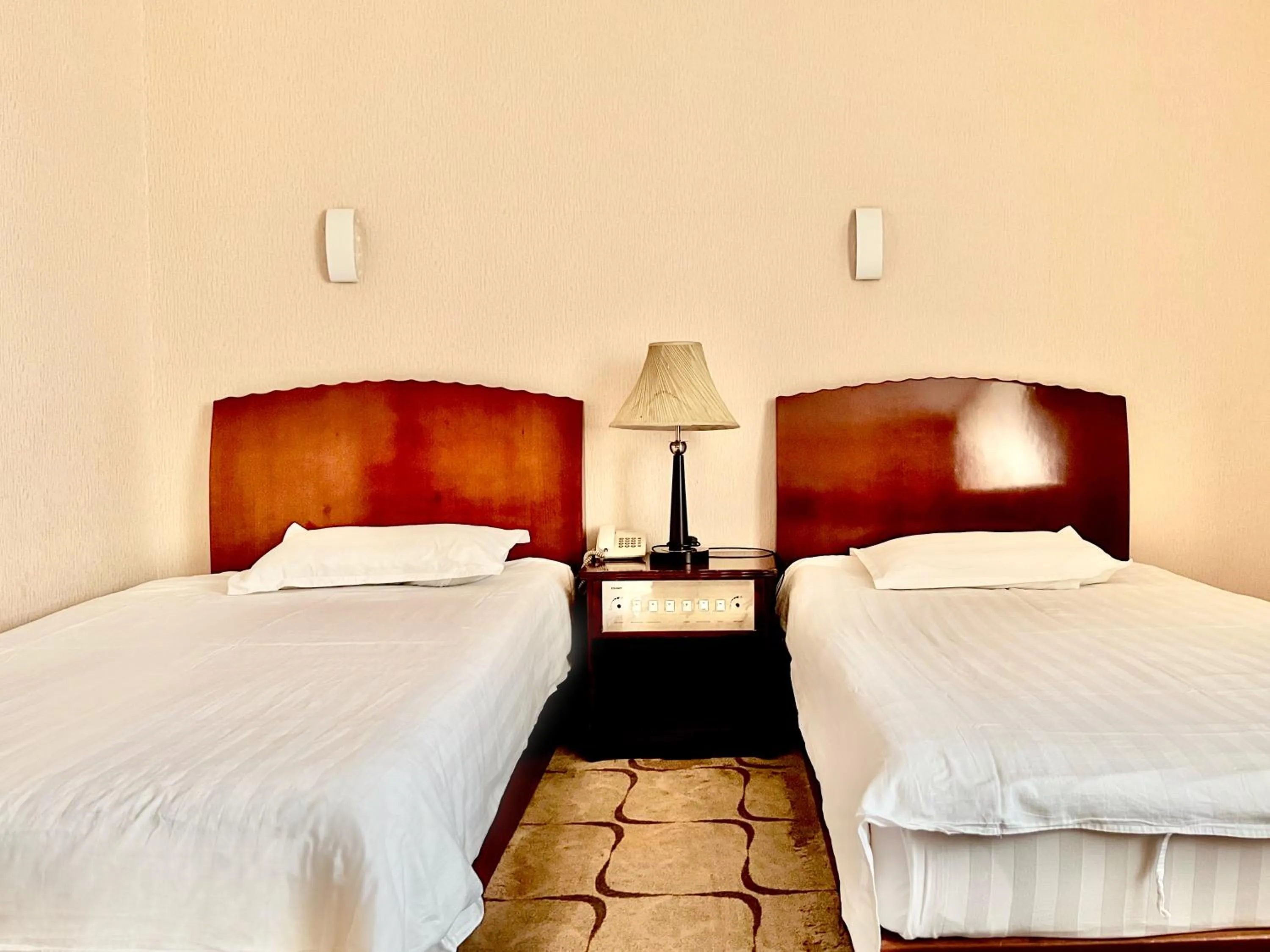 Bed in Kharaa Hotel & Restaurant