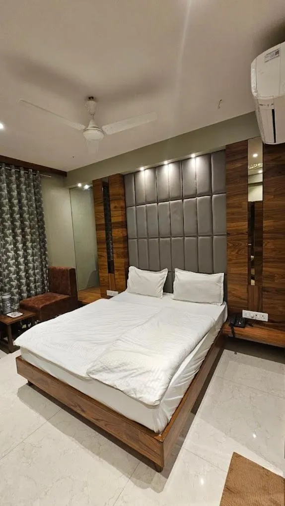 Bed in HOTEL PUSHPA INN