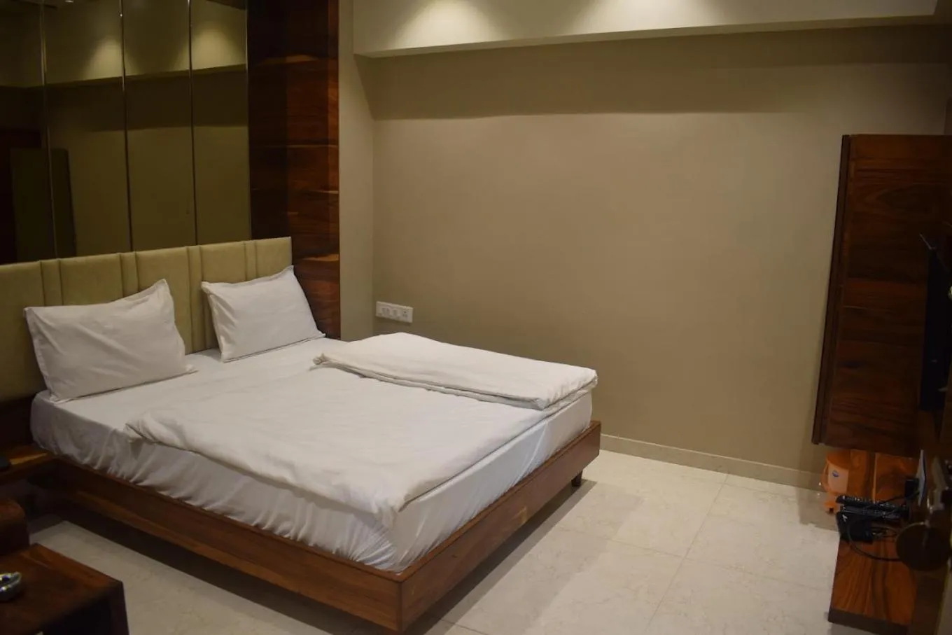 Bed in HOTEL PUSHPA INN