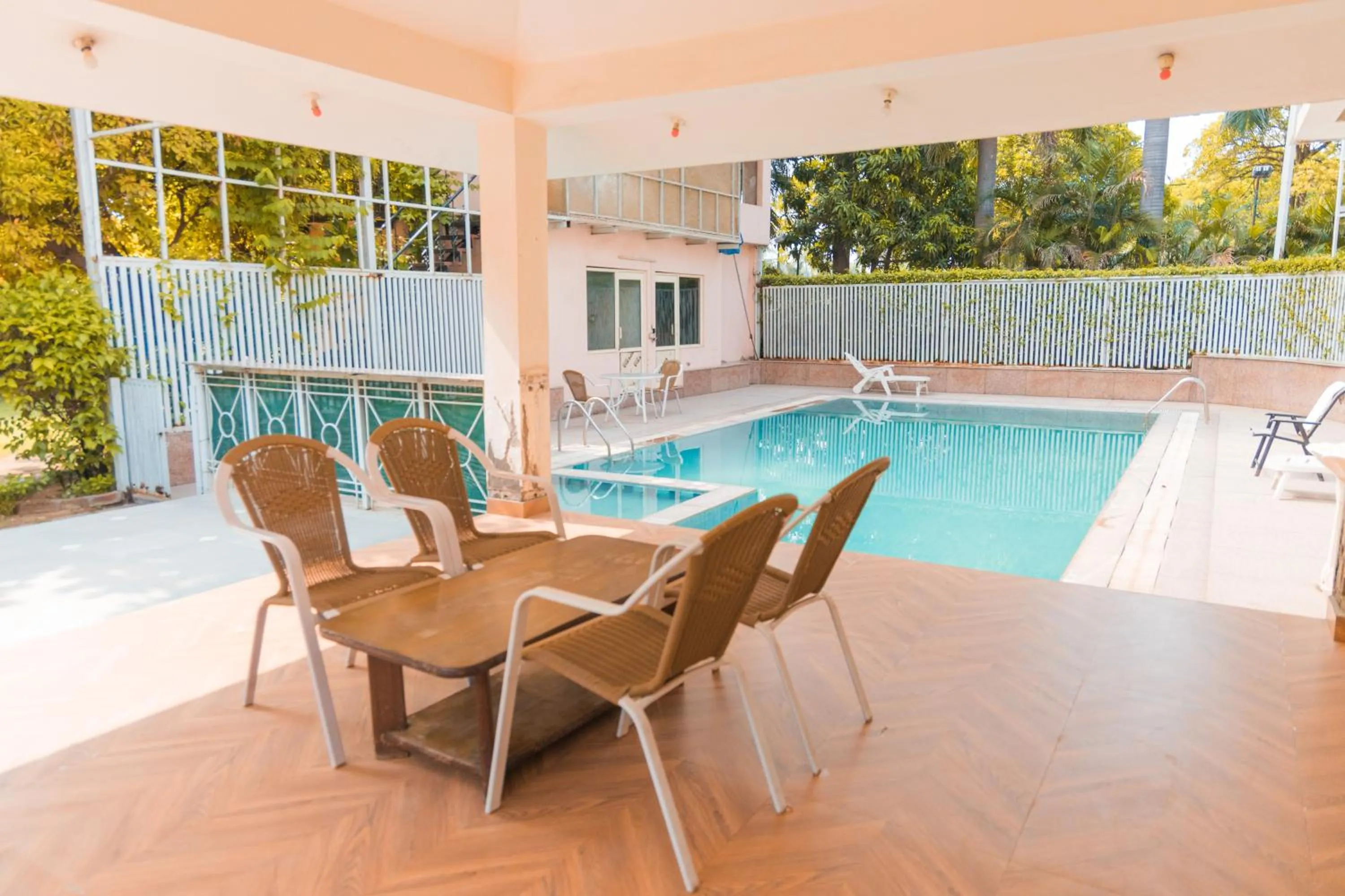 Swimming pool in The Nikunj Hotels