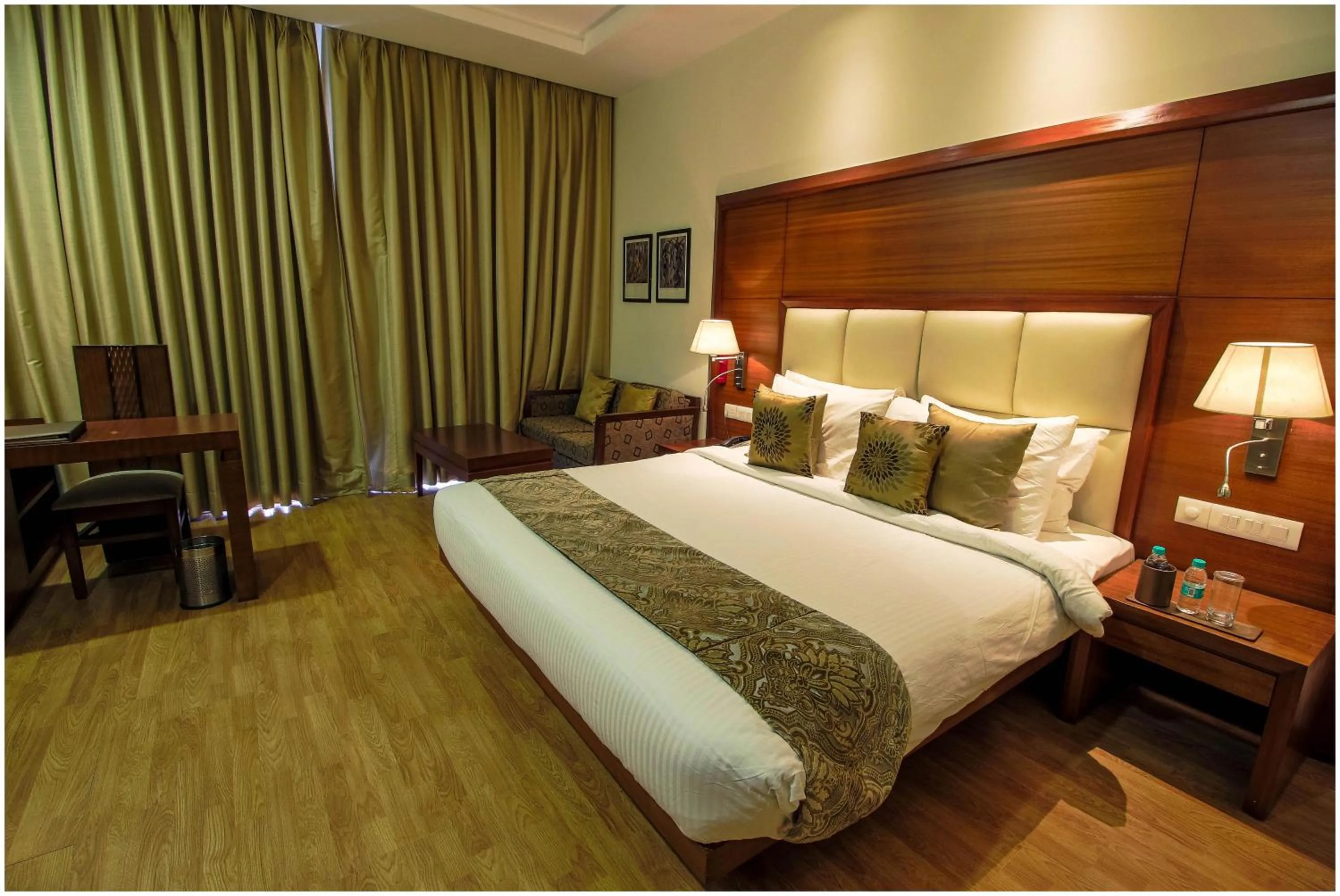 Bedroom, Bed in The Nikunj Hotels