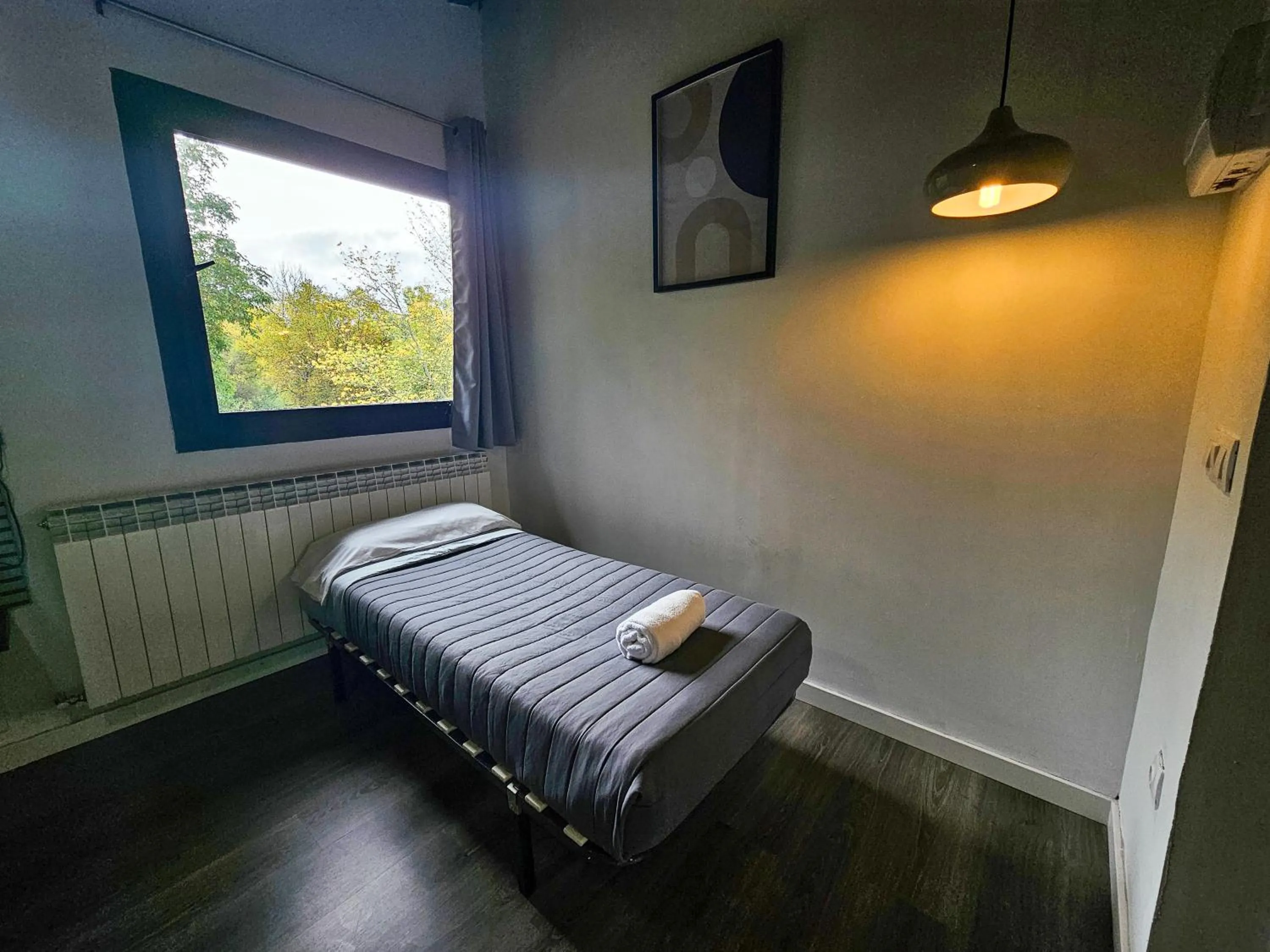 Bed in SOLOPUENT Hotel Rural