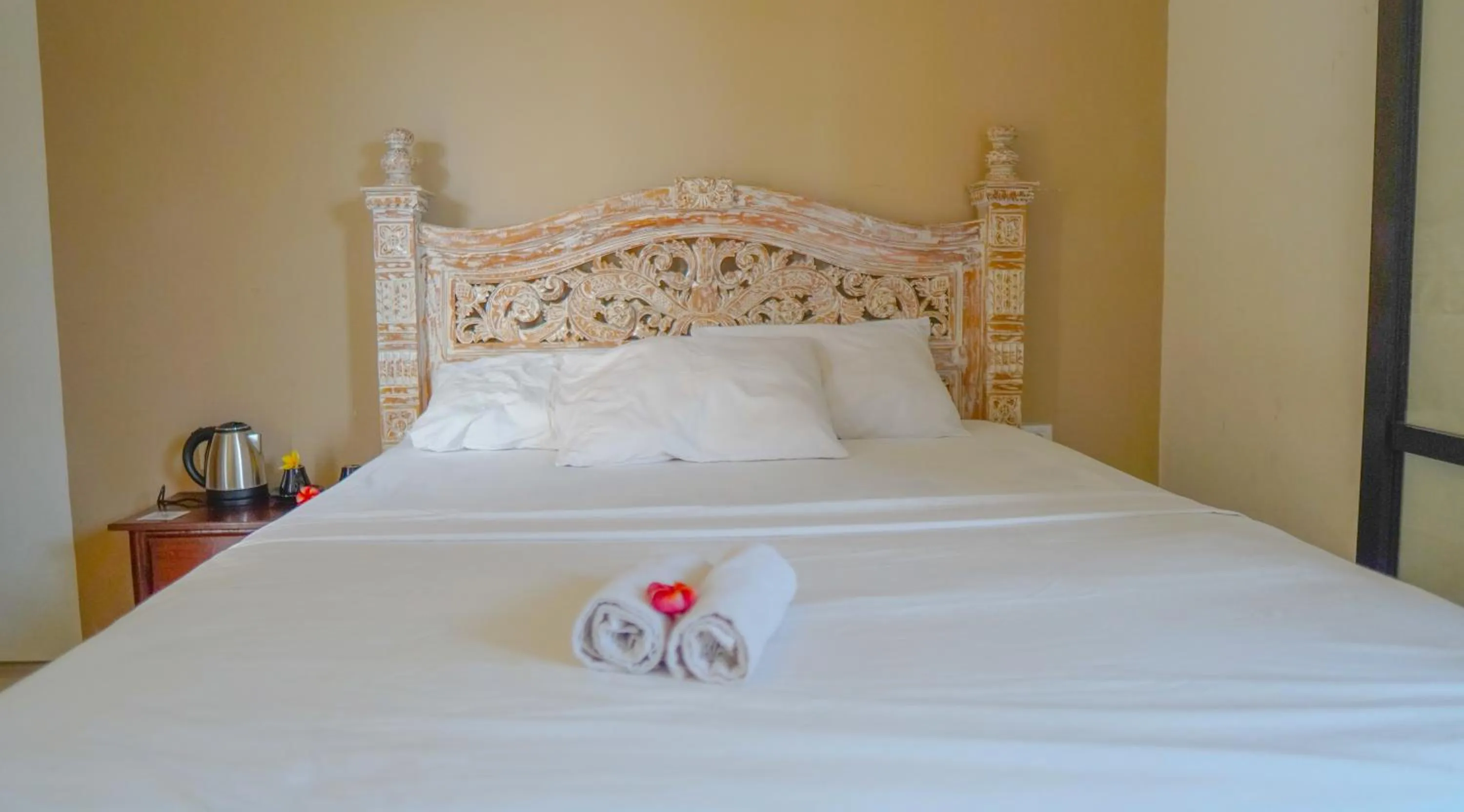 Bed in Dirga's House Sanur View by EPS