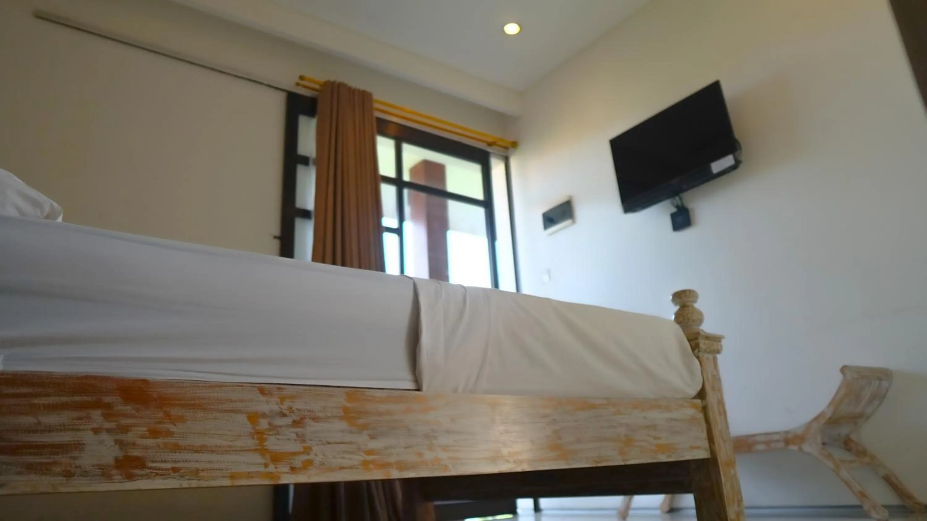 Communal lounge/ TV room, Bed in Dirga's House Sanur View by EPS