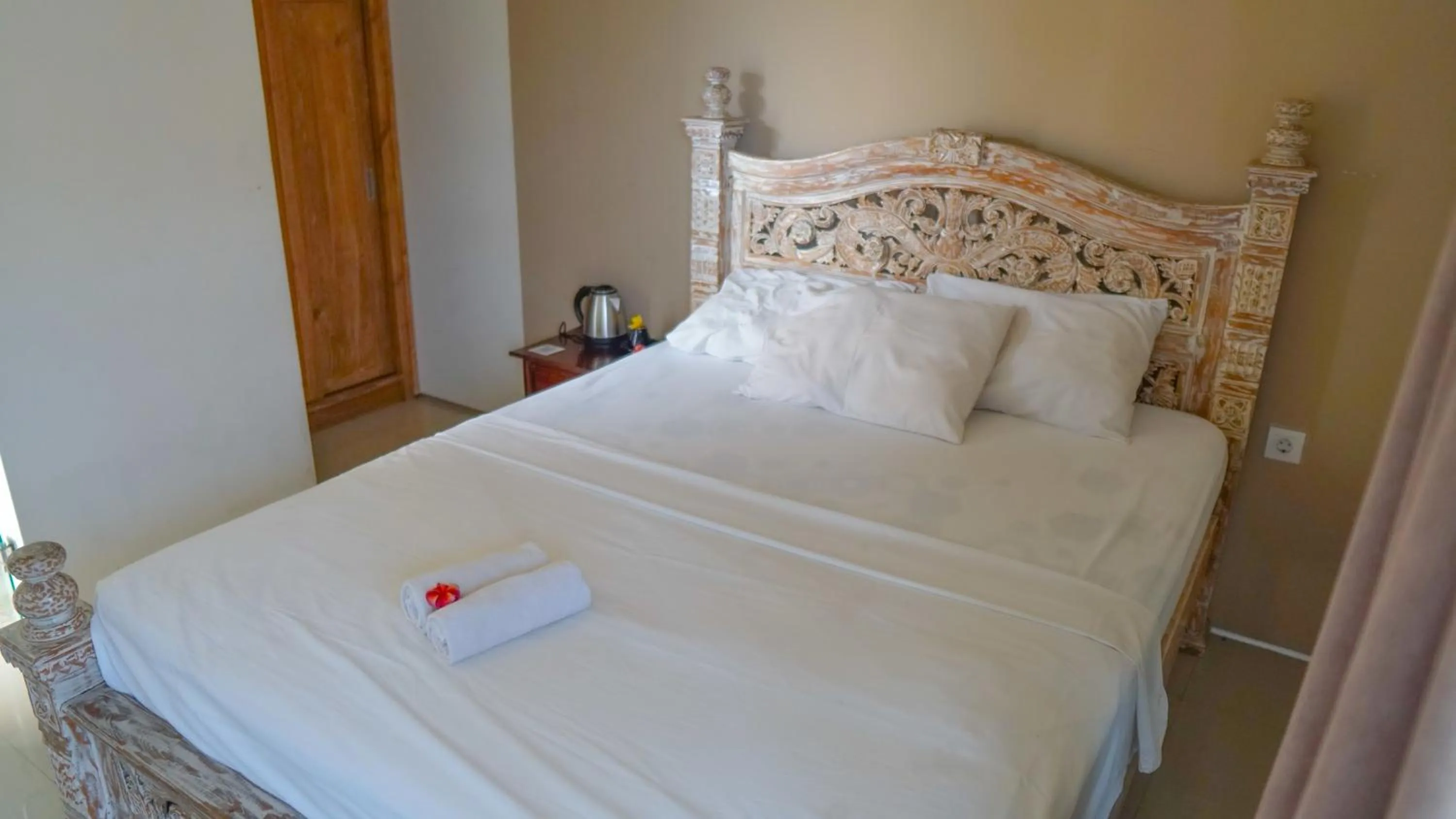 Bed in Dirga's House Sanur View by EPS