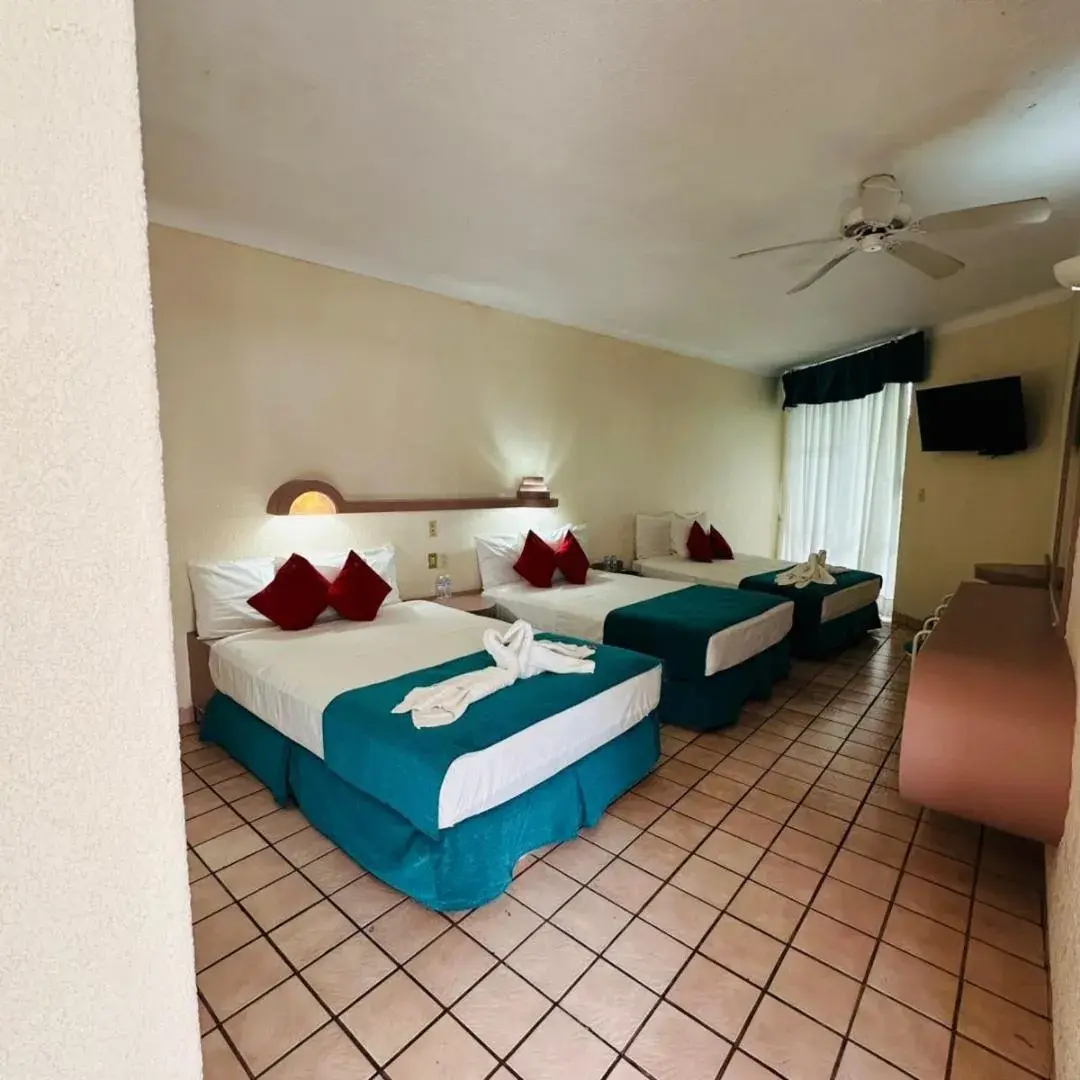 Triple Room in Hotel Hacienda del Rio Oaxtepec Triple Room in Hotel Hacienda del Rio Oaxtepec