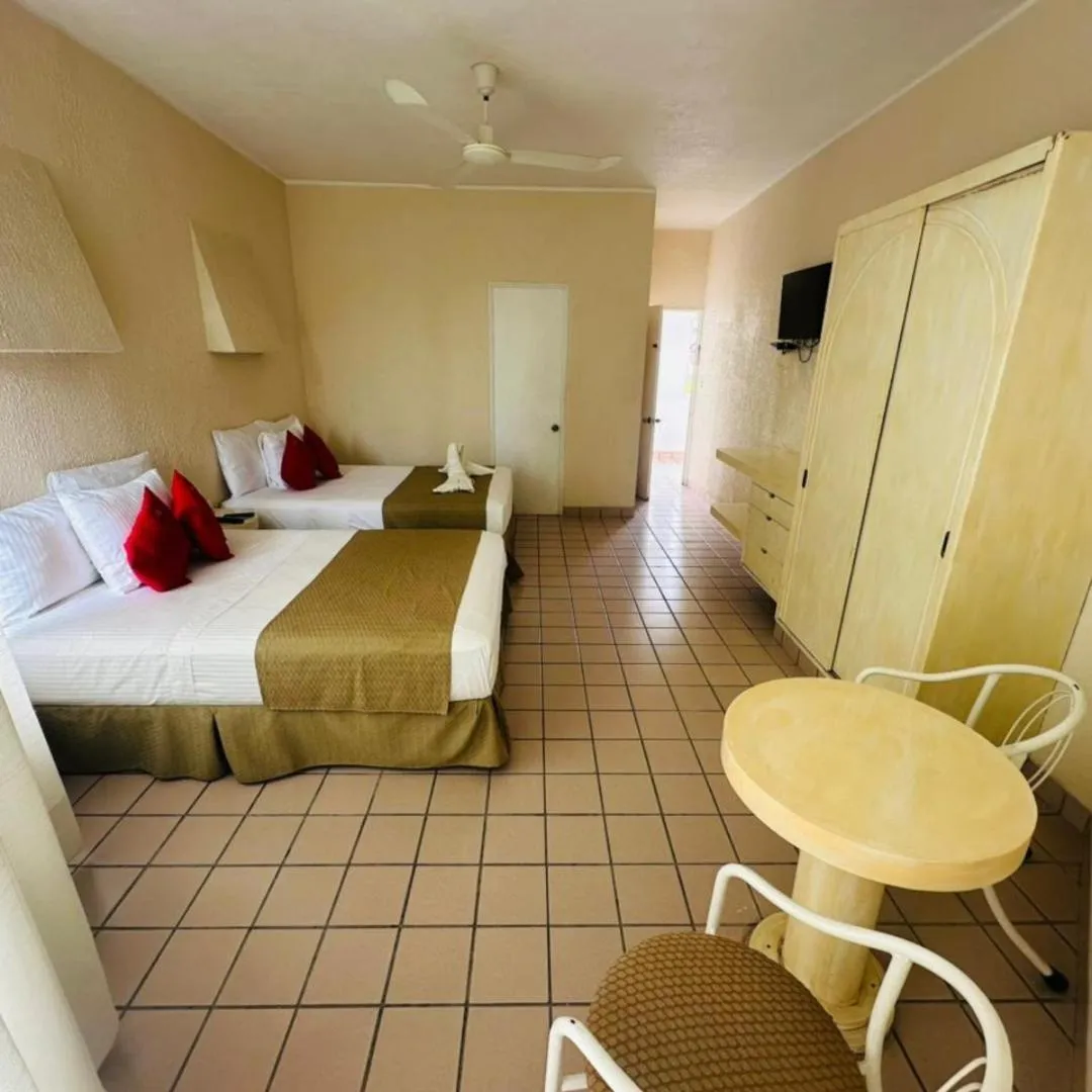 Bed in Hotel Hacienda del Rio Oaxtepec