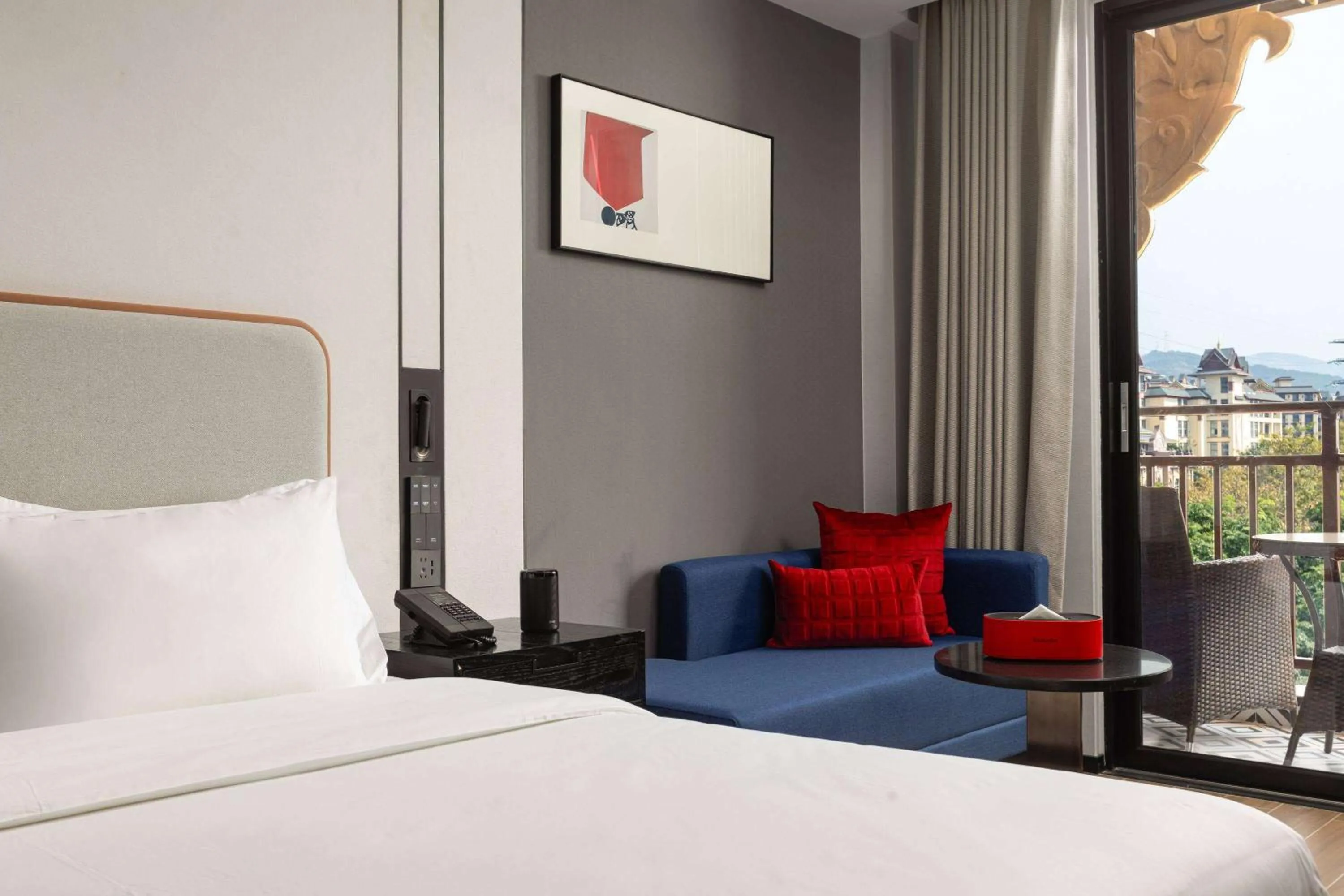 Photo of the whole room, Bed in Ramada by Wyndham Xishuangbanna Jinghong