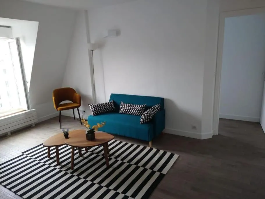 Living room in Super logement cosy avec vue sur Tour Eiffel